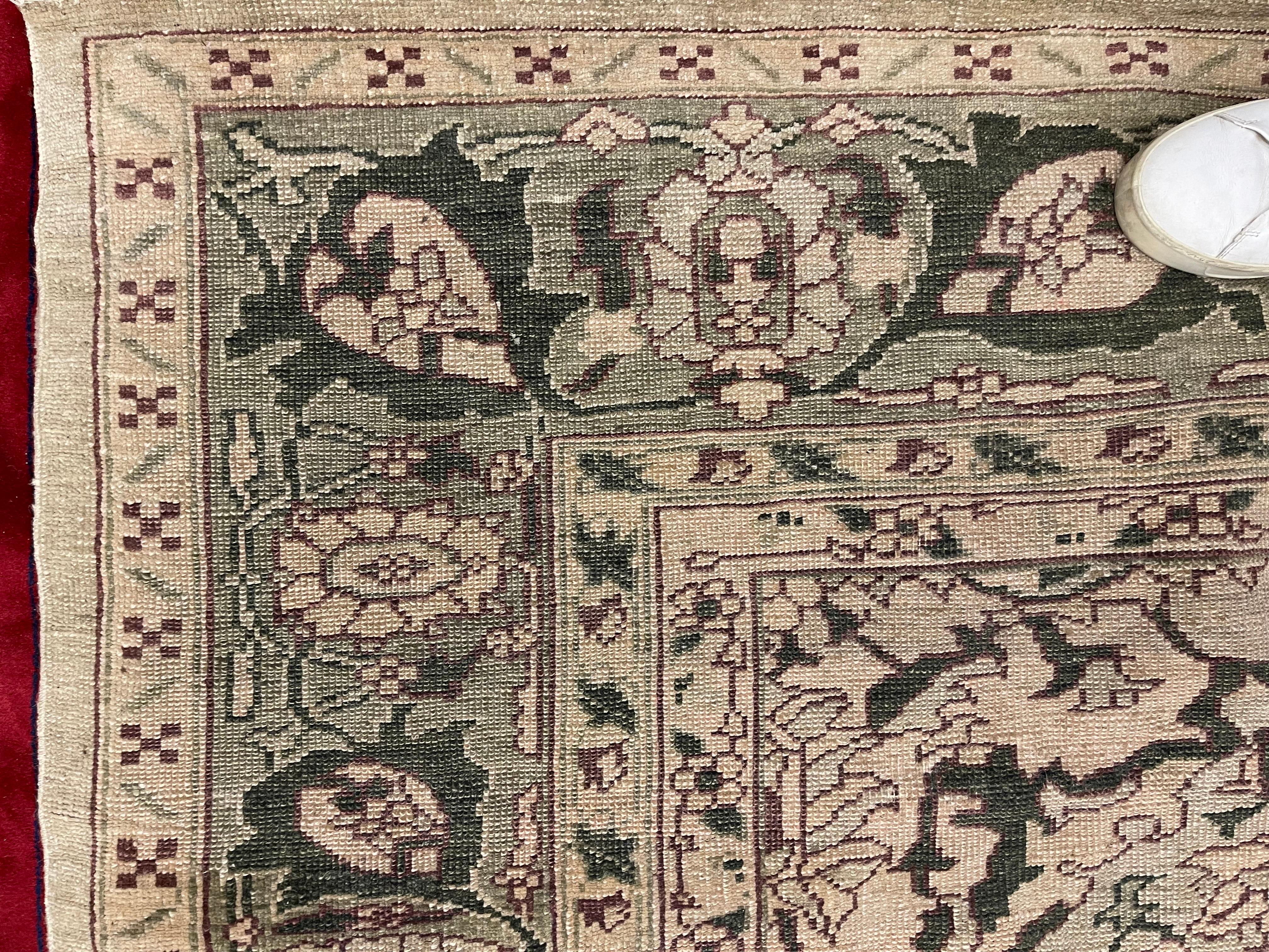 Stunning French Aubusson area rug that features a stunning color scheme and measures 9.5' by 9'.