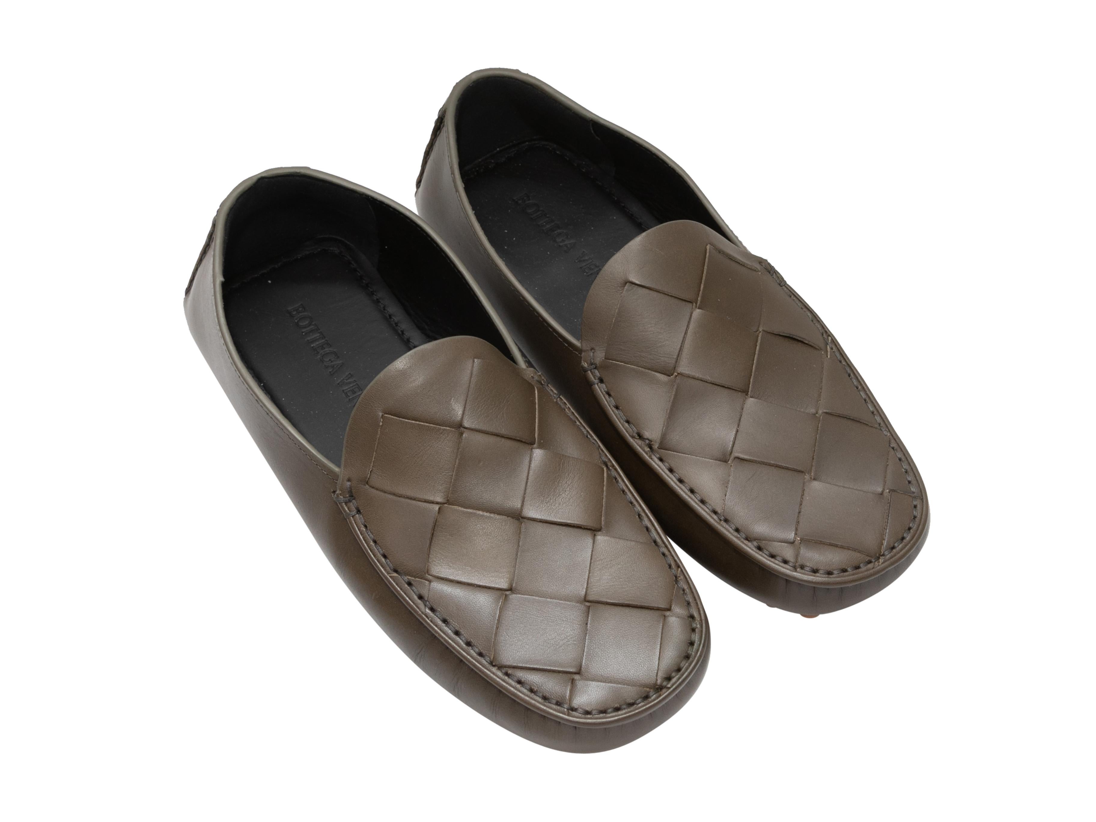Olive Intrecciato leather driving loafers by Bottega Veneta. Rubber bumpers at counters and at soles.