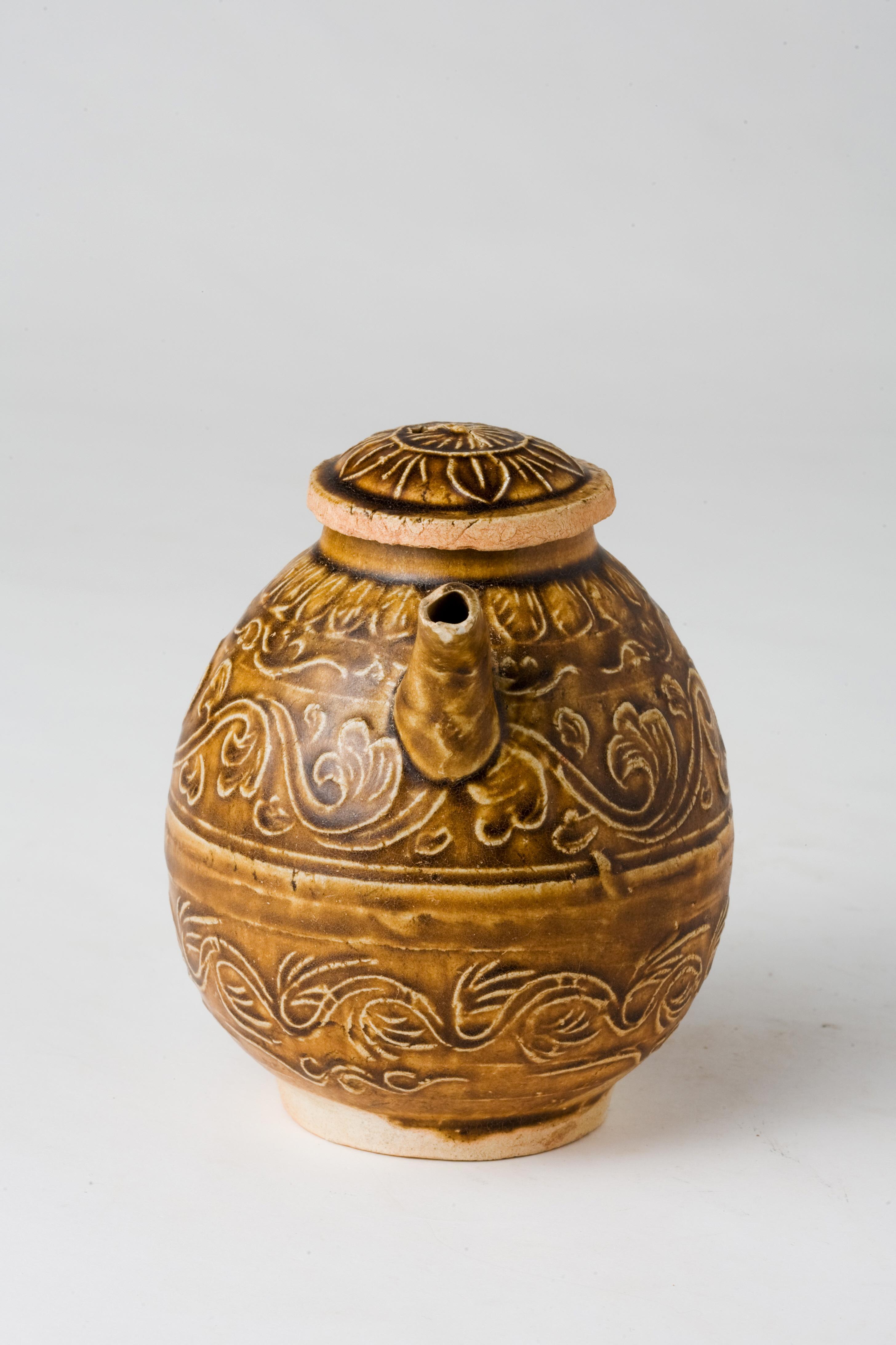 Hong Kong Olive-Brown-Glazed Molded Ewer And Cover, Song-Yuan Dynasty For Sale