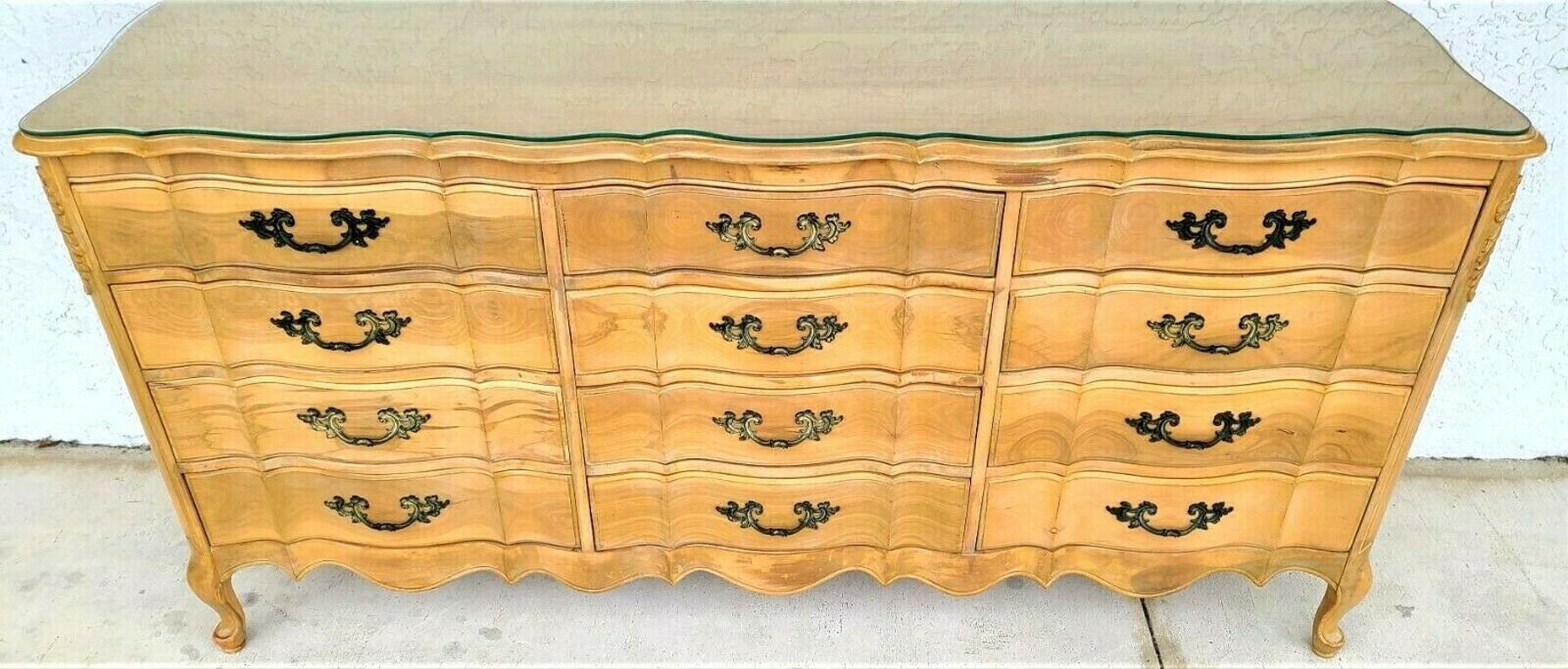 Classic vintage olive burl light wood French Provincial Louis XV style sculpted glass top 12 drawer dresser 
Made of solid wood with 12 drawers and custom cut glass top. 

Approximate measurements in inches
35.5