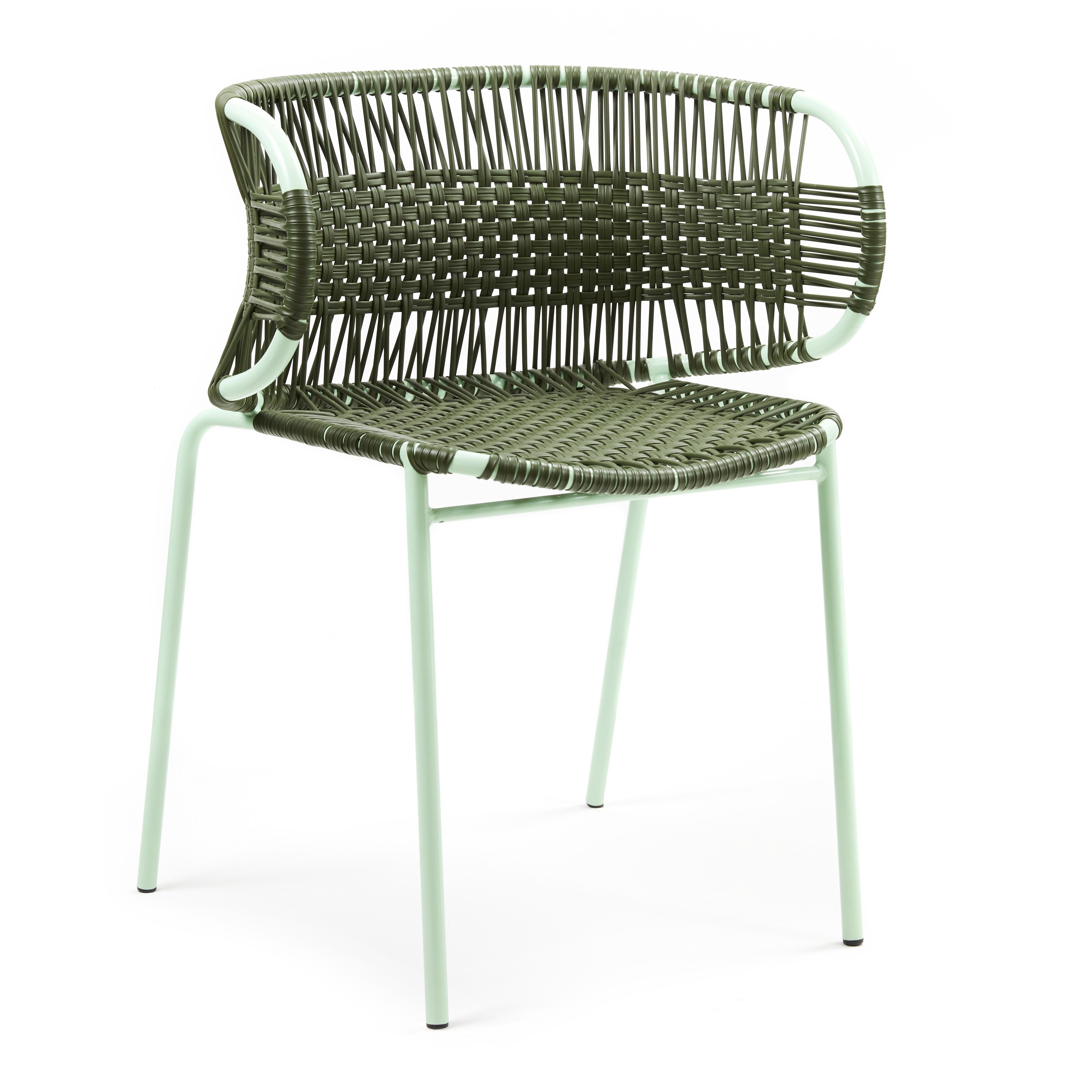 Olive Cielo Stacking chair with Armrest by Sebastian Herkner
Materials: Galvanized and powder-coated tubular steel. PVC strings are made from recycled plastic.
Technique: Made from recycled plastic and weaved by local craftspeople in Cartagena,