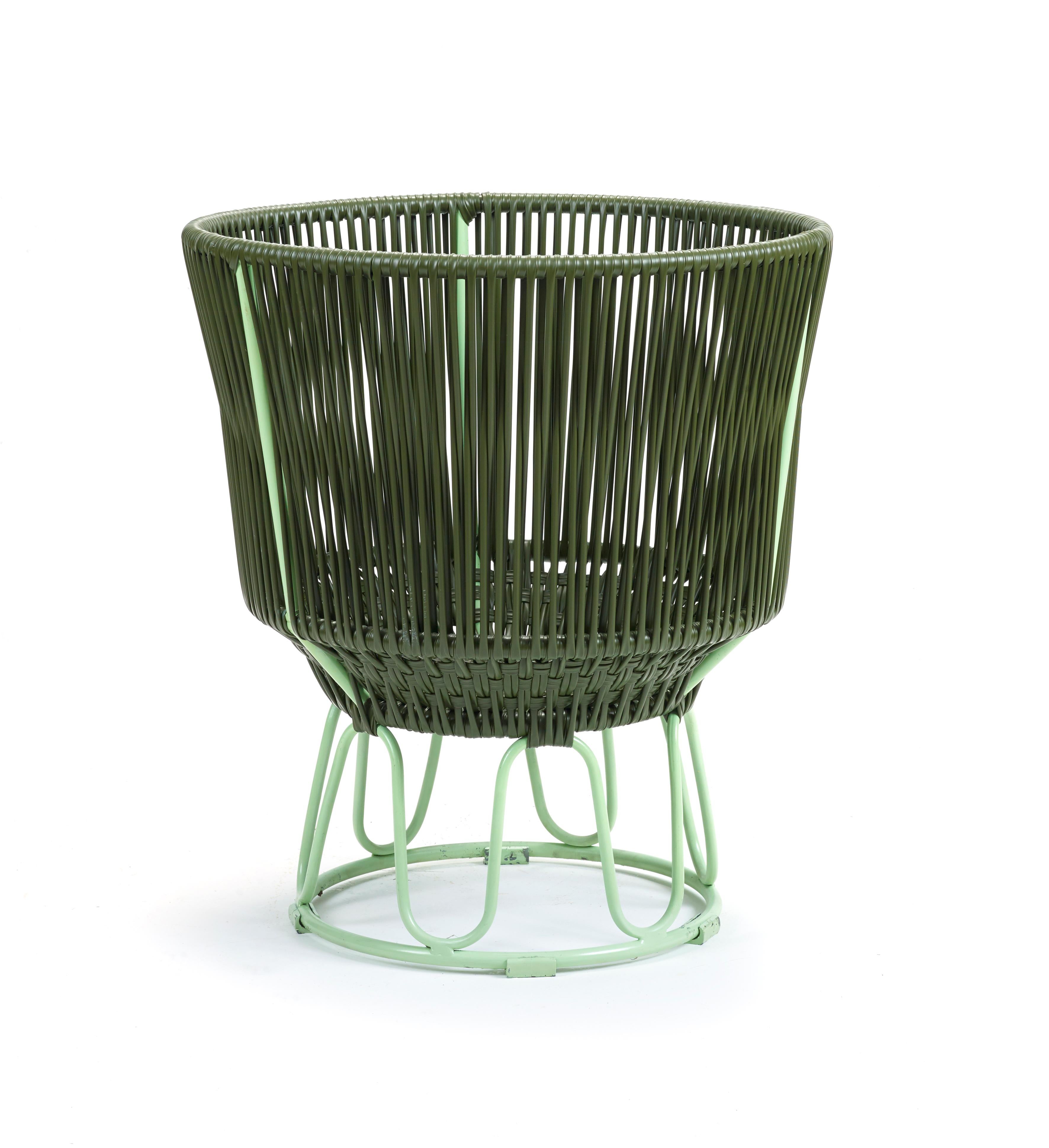 Olive Circo flower Pot 3 by Sebastian Herkner
Materials: Galvanized and powder-coated tubular steel. PVC strings.
Technique: Made from recycled plastic. Weaved by local craftspeople in Colombia. 
Dimensions: 
Top diameter 50 x H 56.5 cm 
Base