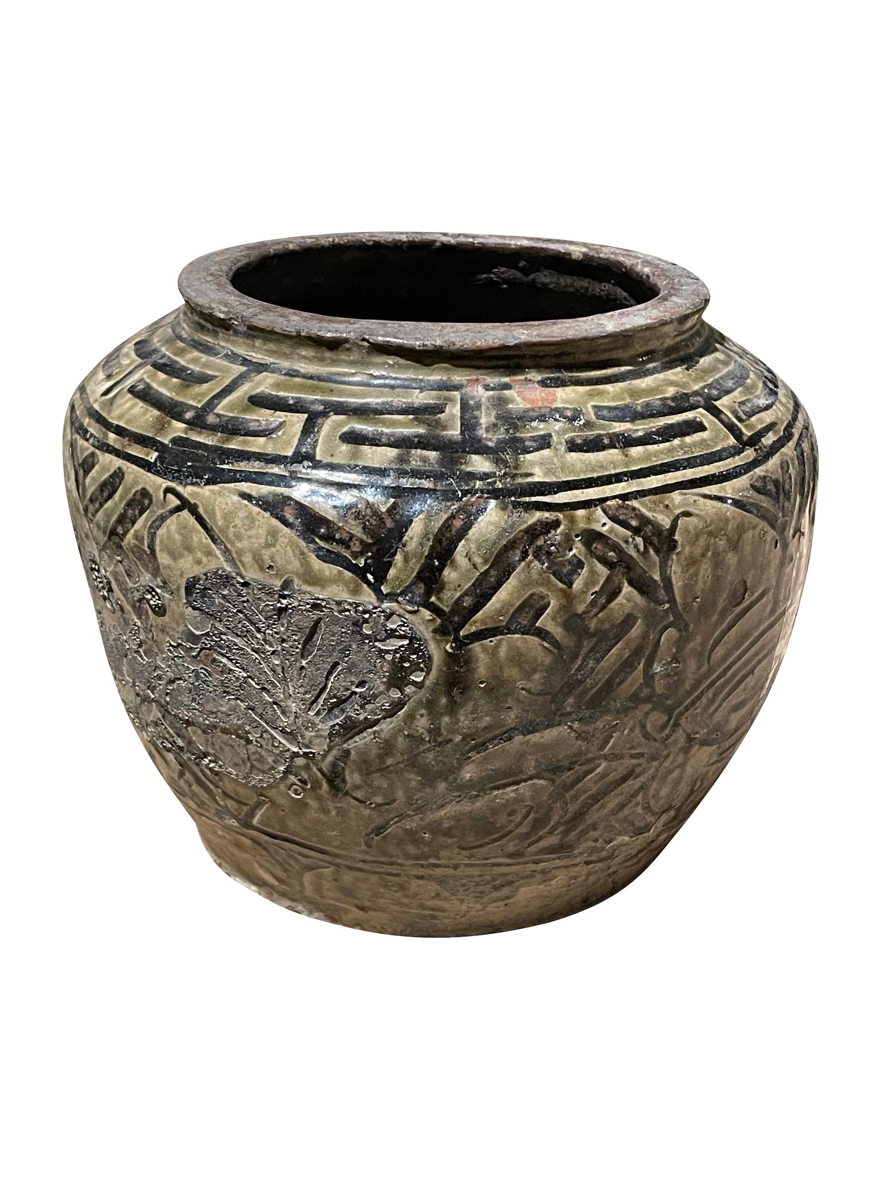 19th century Chinese classic shaped pot with traditional olive glaze.
Decorative geometric design along top of vase.
Natural weathered patina and age.
Part of a large collection
