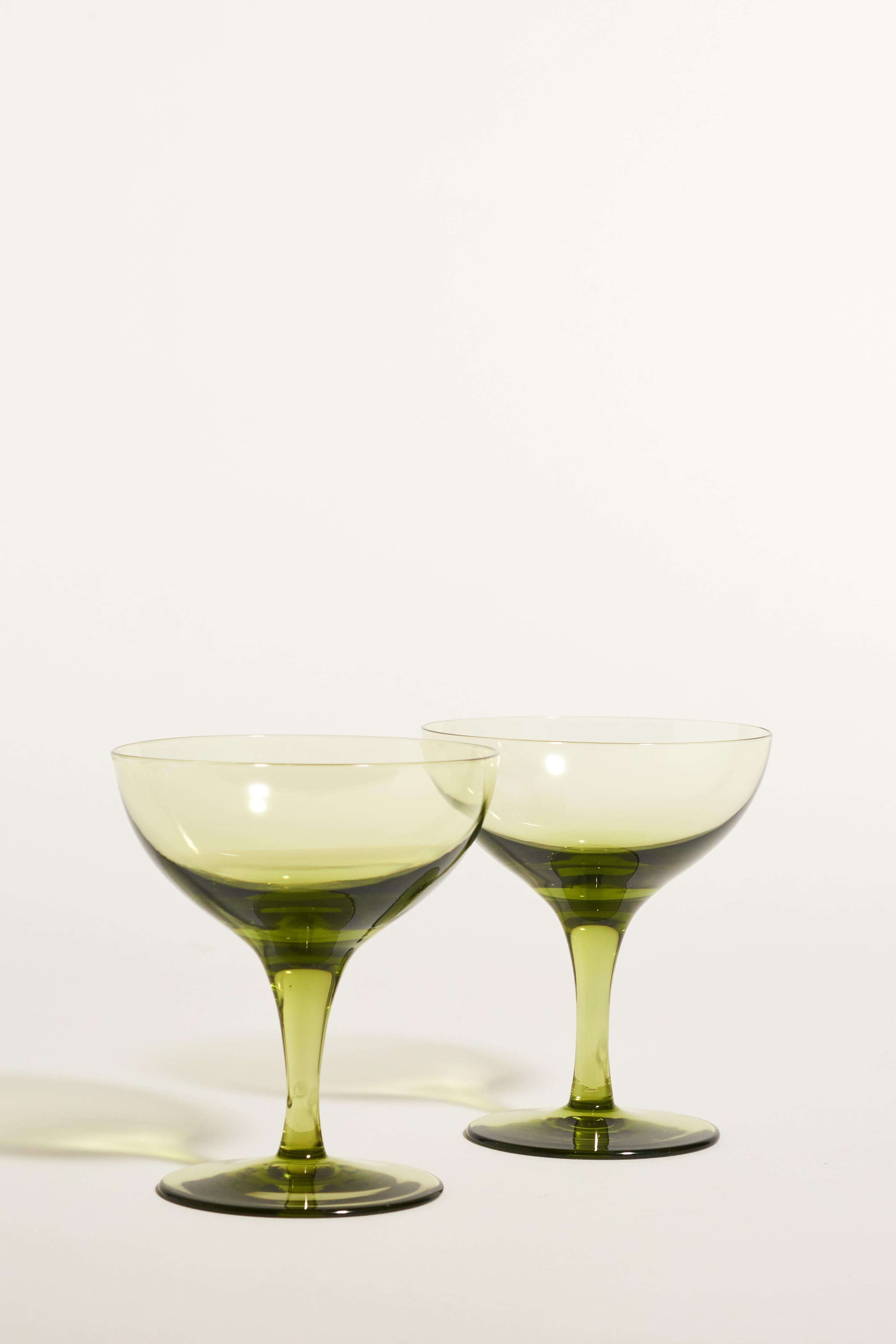 Olive green cocktail glasses in classic coupe shape, set of four.