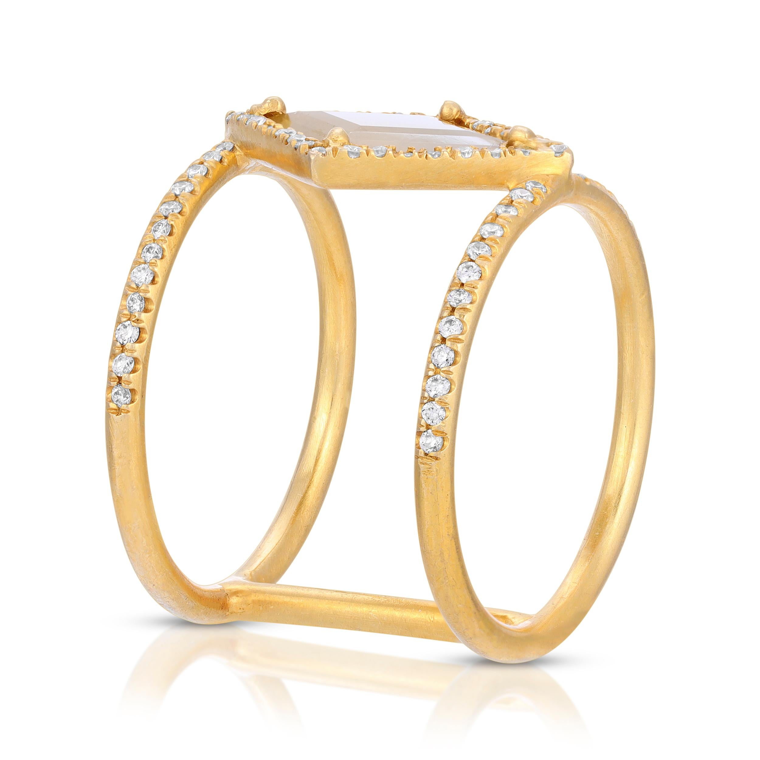 This double band ring features a 1.19 ct. Yellow Green Kite Shaped Diamond Slice with 0.52 ct. vs quality Diamond Pave Halo set in 18K Matte Yellow Gold. The Diamond Pave goes 1/3 of the way around the Double Band. The ring is handmade in Los