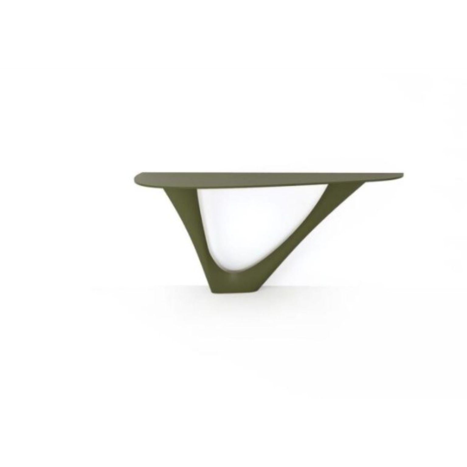 Verde oliva G-Console base de acero con tapa de acero mono by Zieta
Dimensiones: P 43 x An 159 x Al 75 cm 
Material: Acero al carbono. 
También disponible en diferentes colores y dimensiones.

La Consola G es otro objeto biónico de nuestra