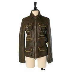 Olive green leather jacket with pocket with patchwork on the back GALLIANO
