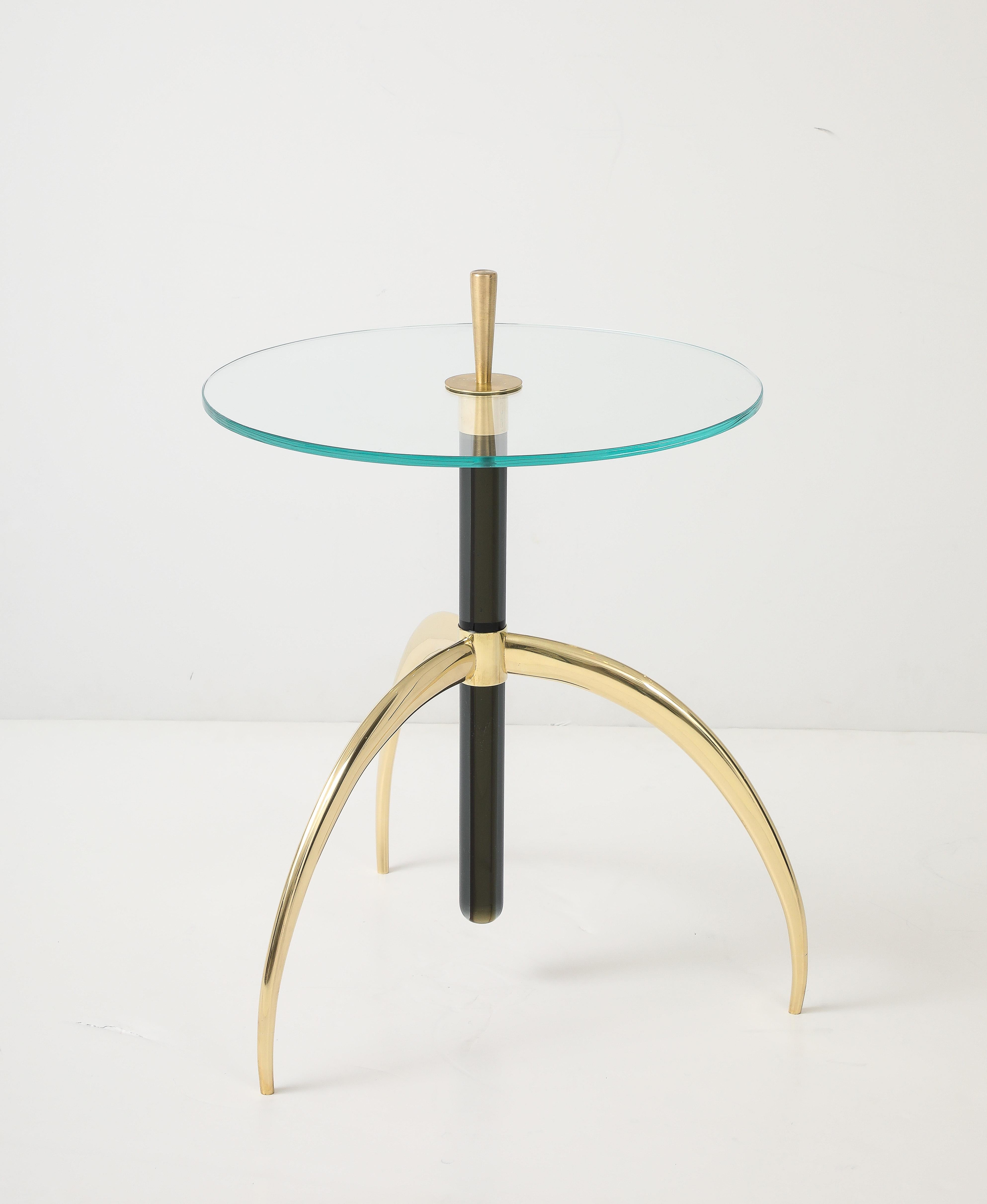 Contemporary Murano glass side table featuring an olive green center and brass legs. A great statement piece for any setting. 