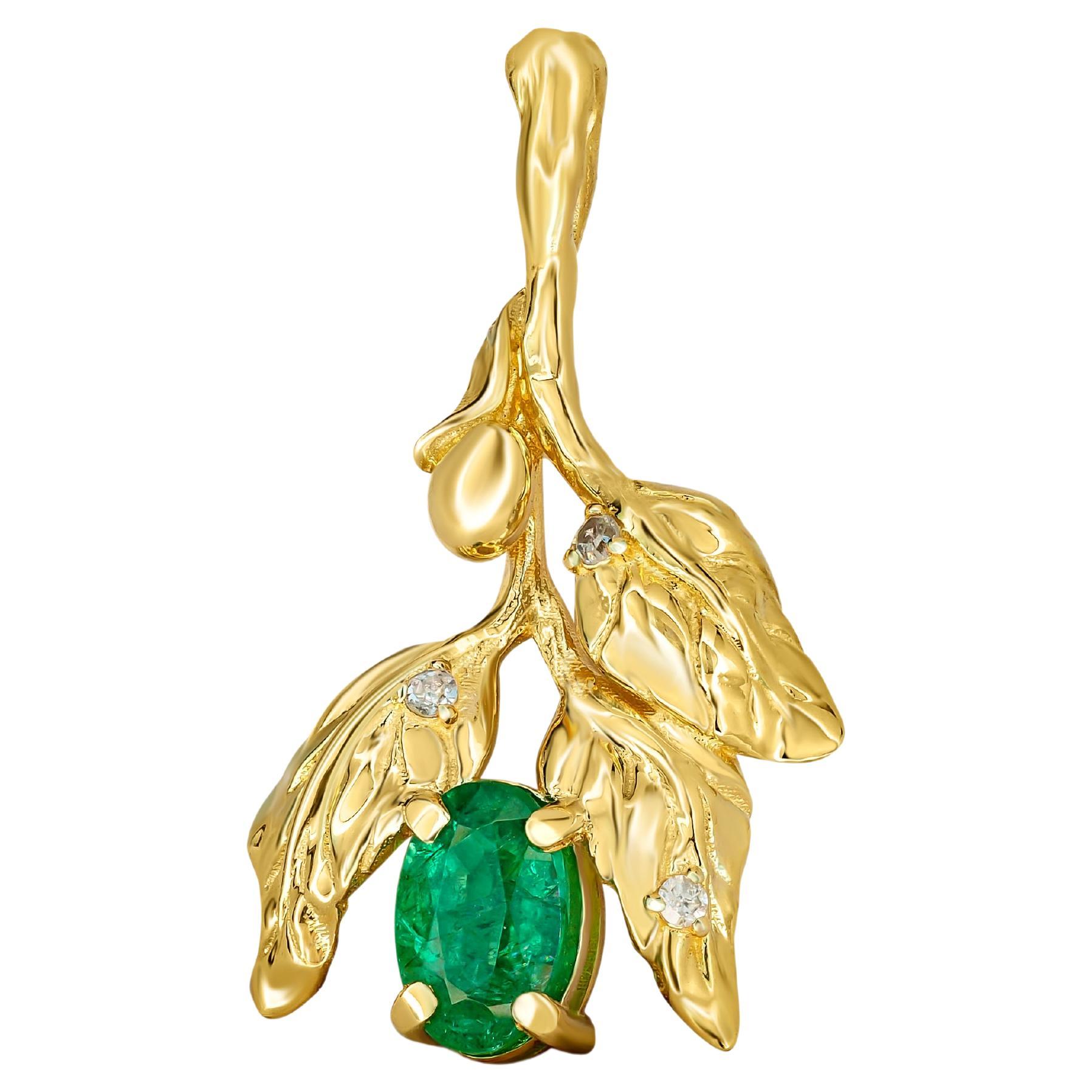 Olive pendant with emerald.