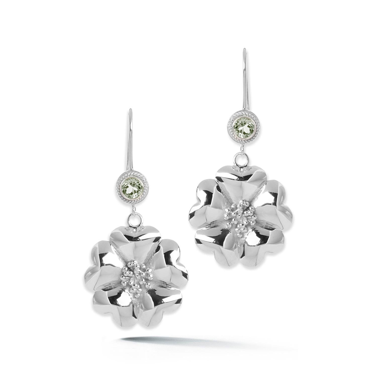 Designed in NYC

.925 Sterling Silver 2 x 5 mm Olive Peridot Blossom Stone Wire Hook Earrings. No matter the season, allow natural beauty to surround you wherever you go. Blossom stone wire hook earrings: 

Sterling silver 
High-polish 
Light-weight