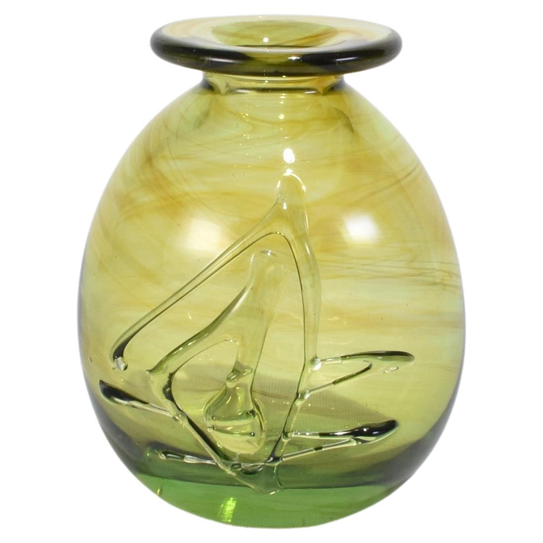 Vase mit Olivenbaumstamm