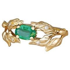 Olive tree gold ring with emerald. 