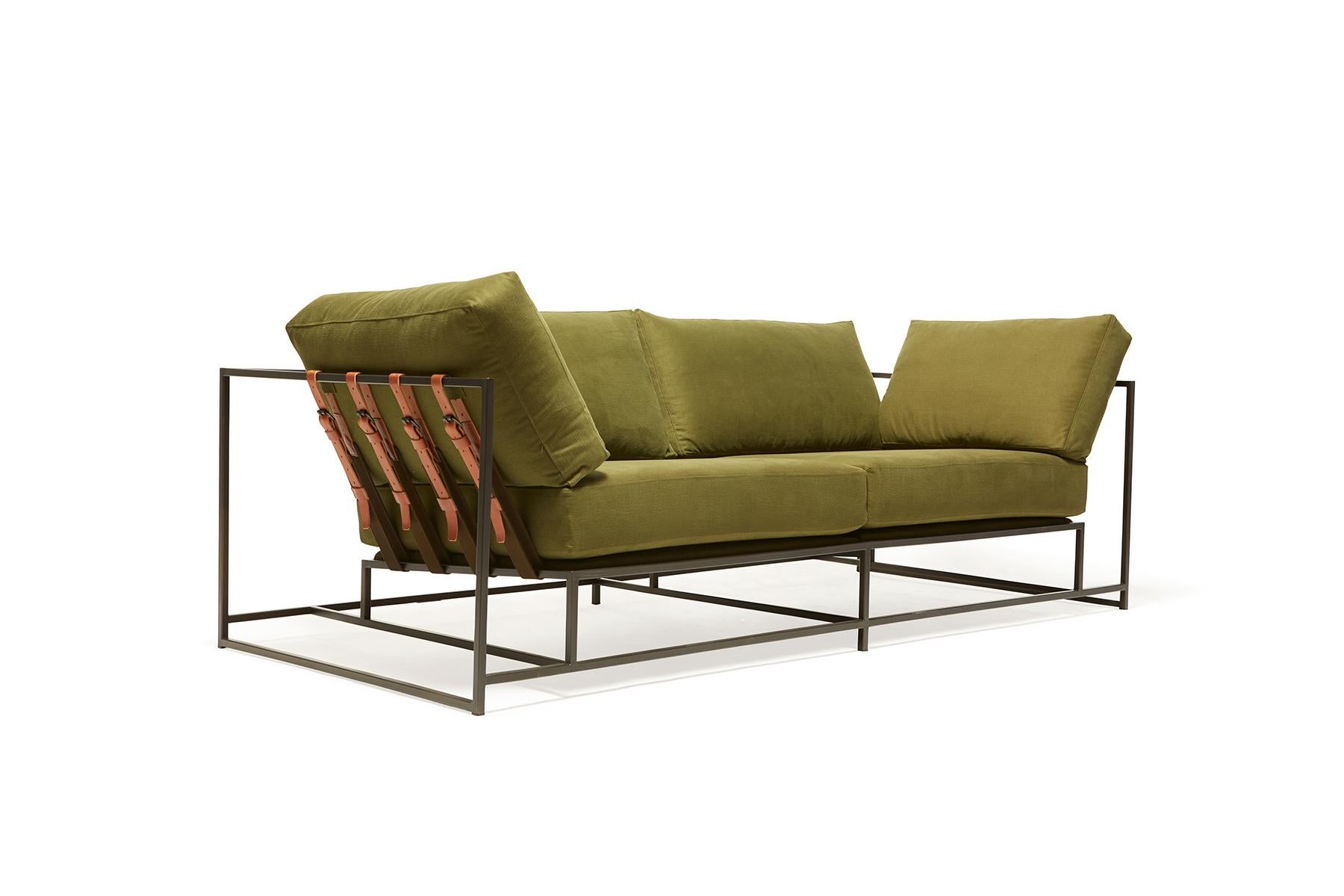 
The Inheritance Two Seat Sofa by Stephen Kenn is as comfortable as it is unique. The design features an exposed construction composed of three elements - a steel frame, plush upholstery, and supportive belts. The deep seating area is perfect for a