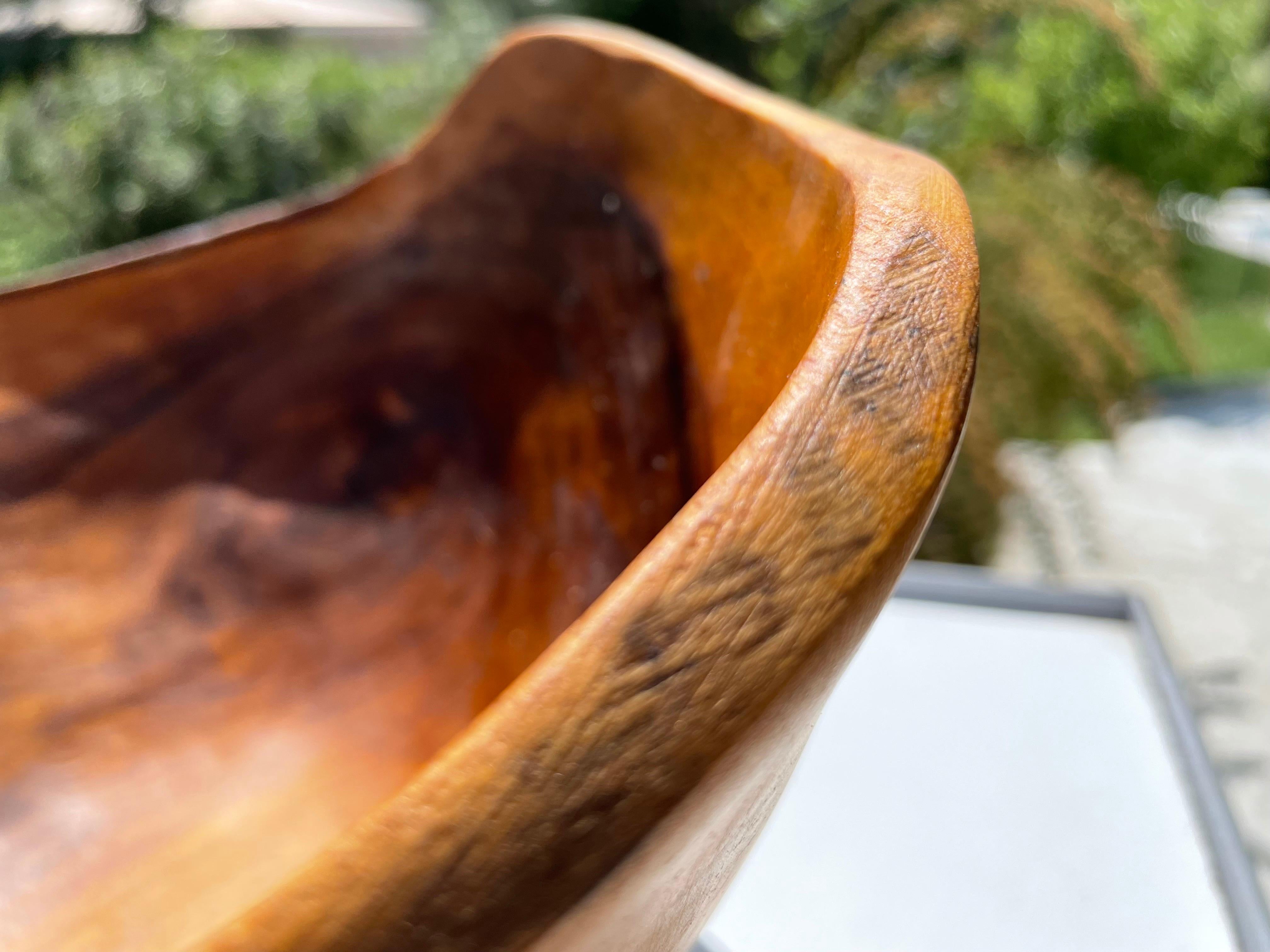 This bowl is a decorative bowl, made in France circa 1960. It is the French Riviera Style. The Olive wood is in a brown color.