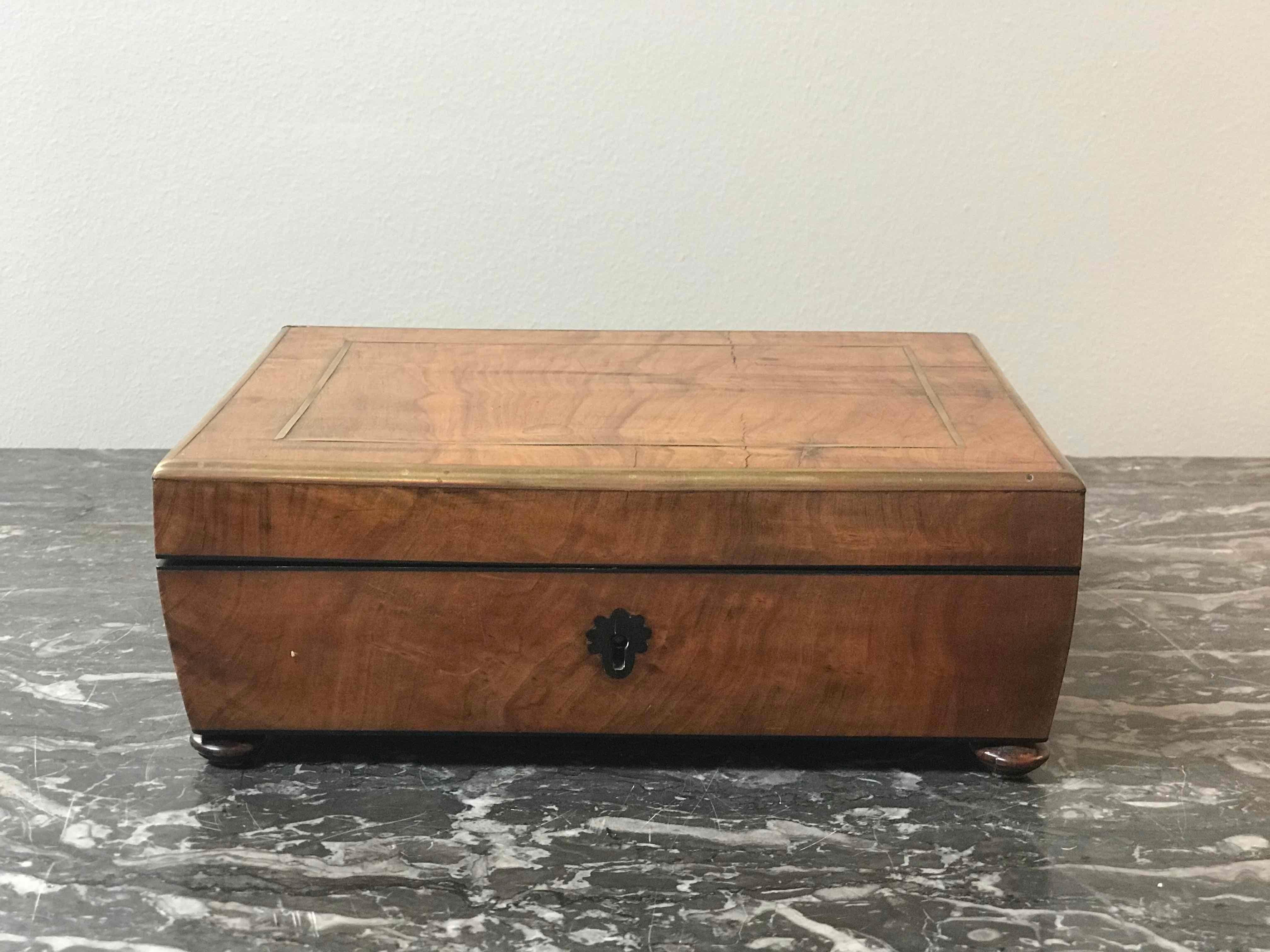 Olive wood brass inlaid box from mid-19th century England. 