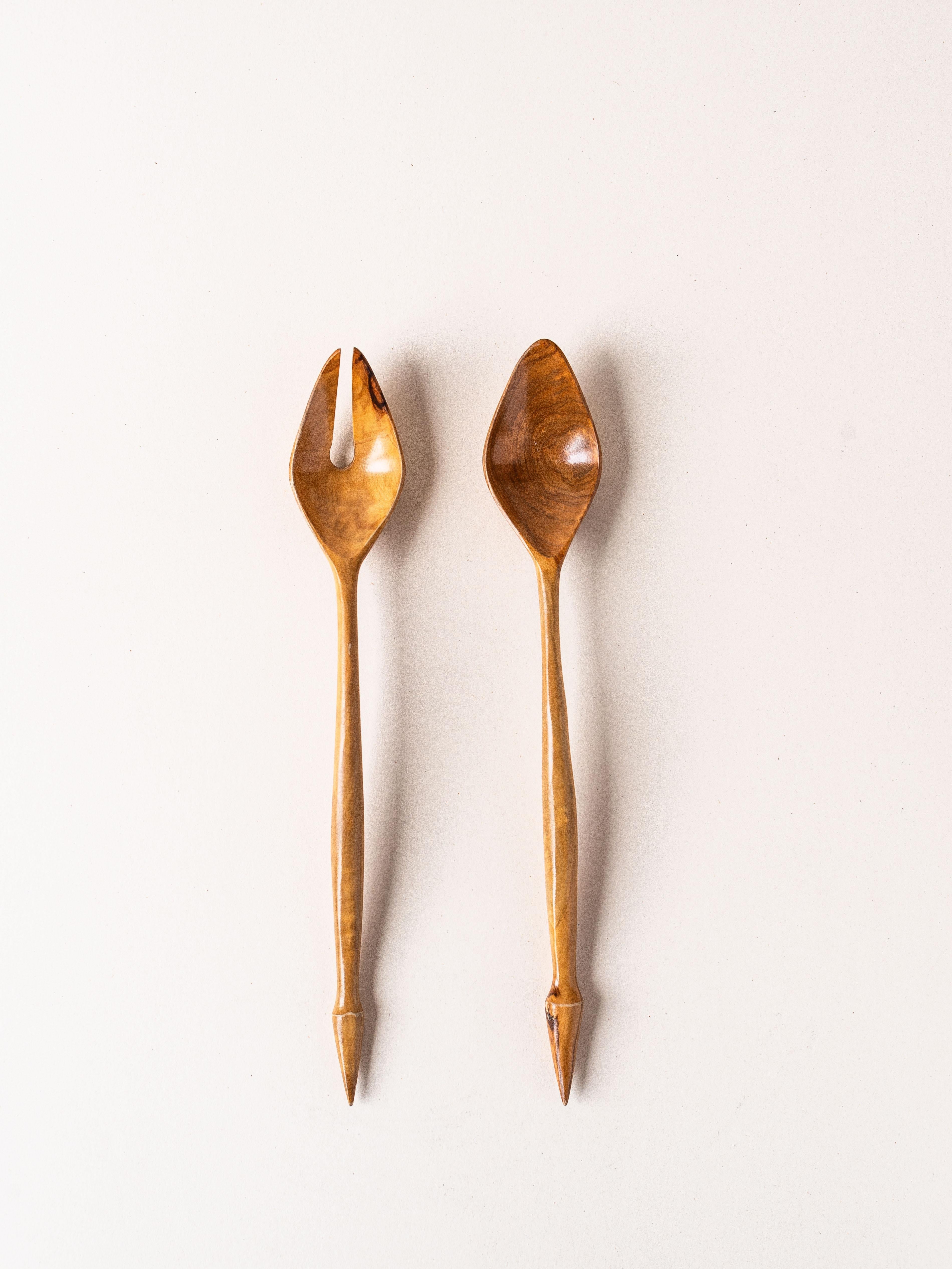 Olive Wood Salad Servers, France 1970s.

Very elegant design in perfect condition.

Servers are polished, which gives them a very soft touch.

A chic piece to add to the kitchen !