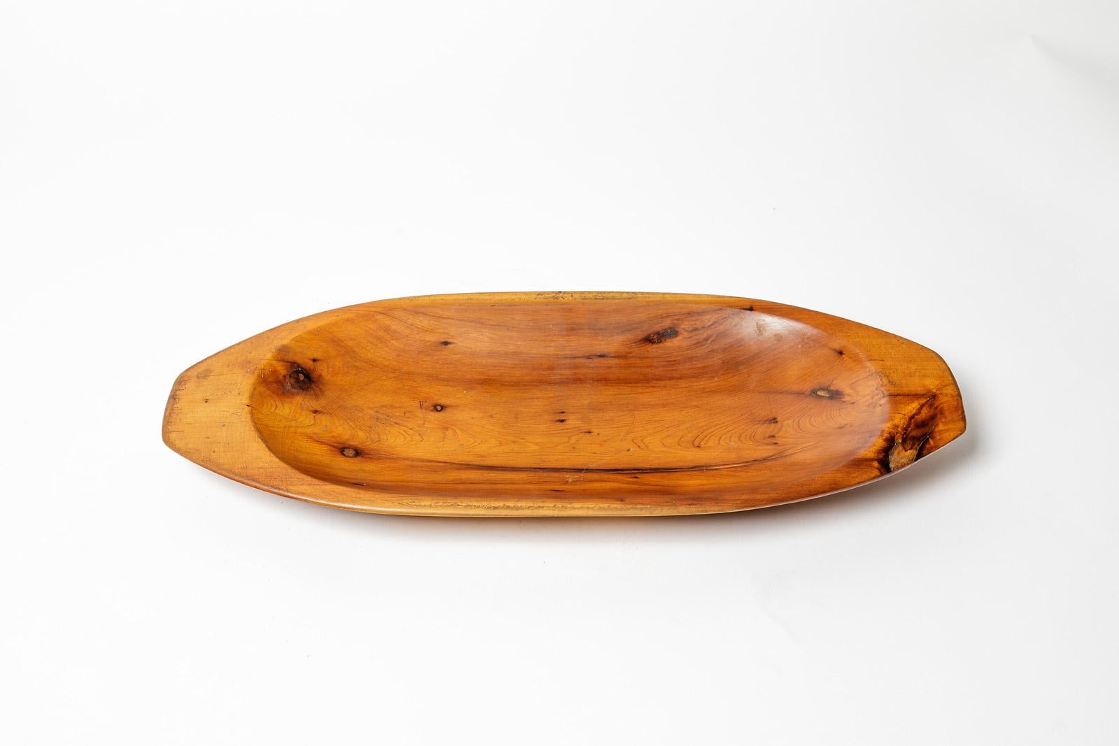 French design - 20th century - In the style of Alexandre Noll

Realised circa 1950

Olive wood sculptural plate or dish / vide poche

Original good condition

Measures: Height : 4 cm Large : 20 cm Long : 47 cm.