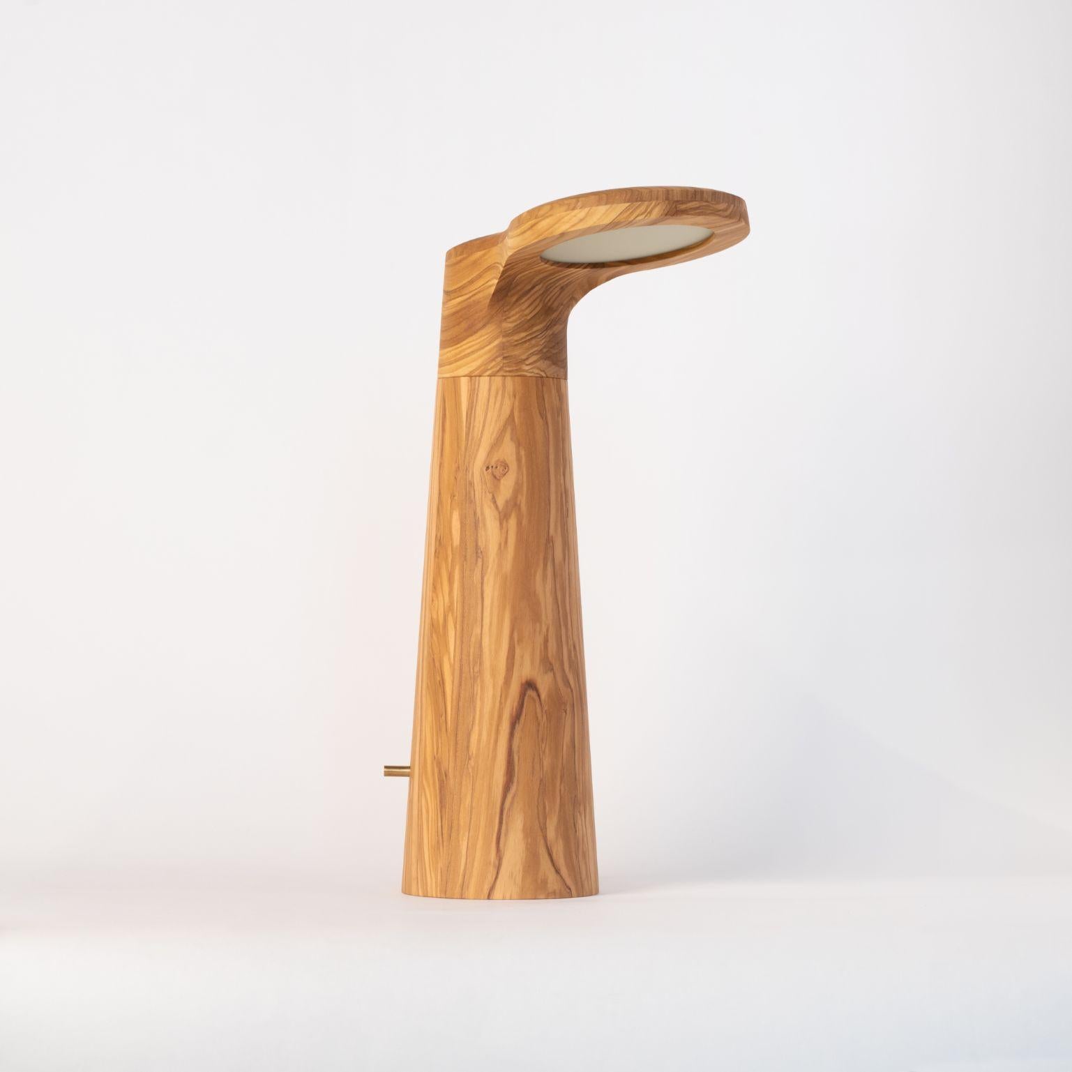 Olive wood - studio light by Isato Prugger
Dimensions: 37 x 22 x 13 cm
Materials: olive wood 
Limited edition of 100

Also available in wenge wood, canaletto walnut, padouk, oak, white ash. All our lamps can be wired according to each country.