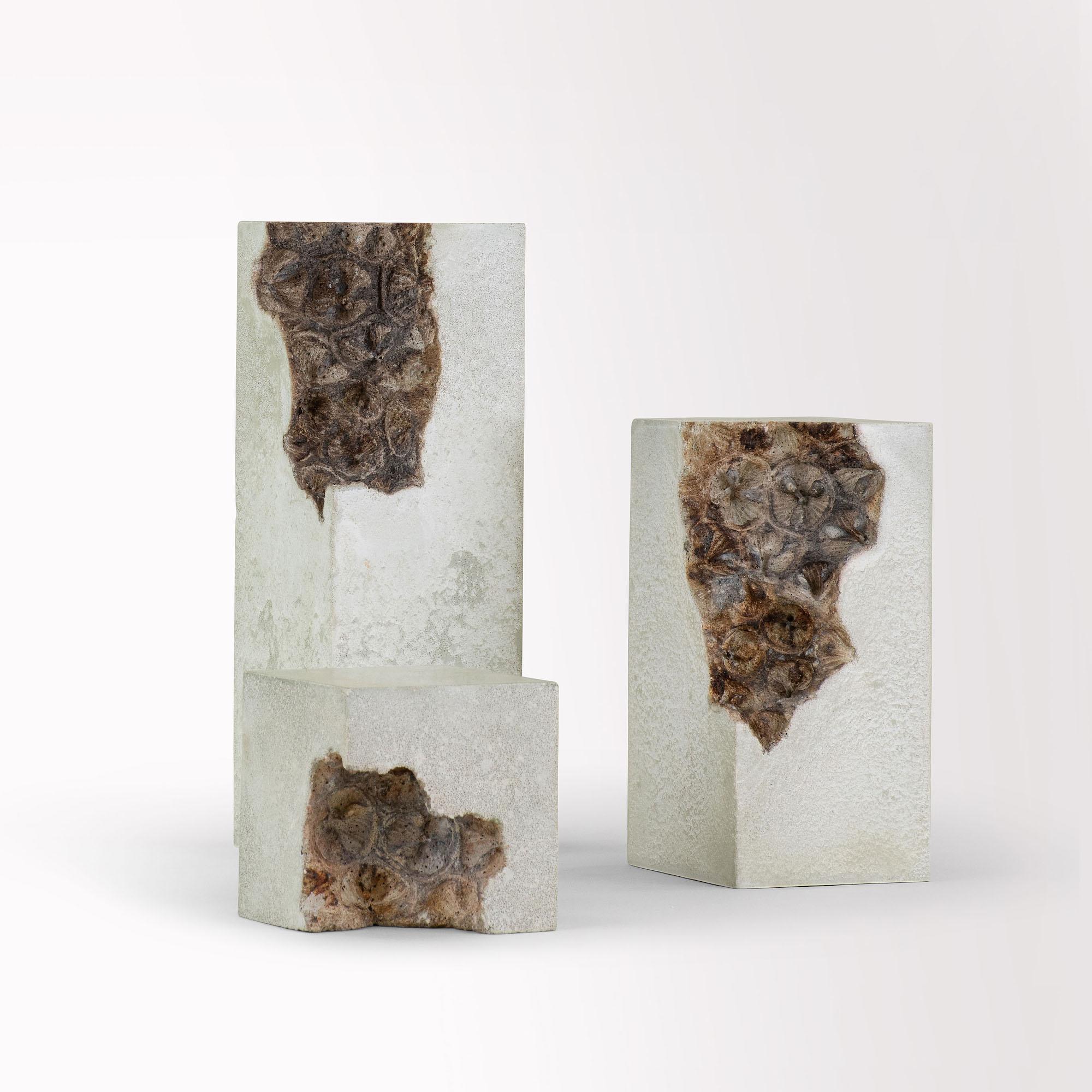 Traces (Trinity) is a unique concrete sculpture (timber wood base) by contemporary English sculptor Oliver Ashworth-Martin, dimensions are 19 × 19 × 19 cm (7.5 × 7.5 × 7.5 in).
This sculpture is signed by the artist and comes with a certificate of