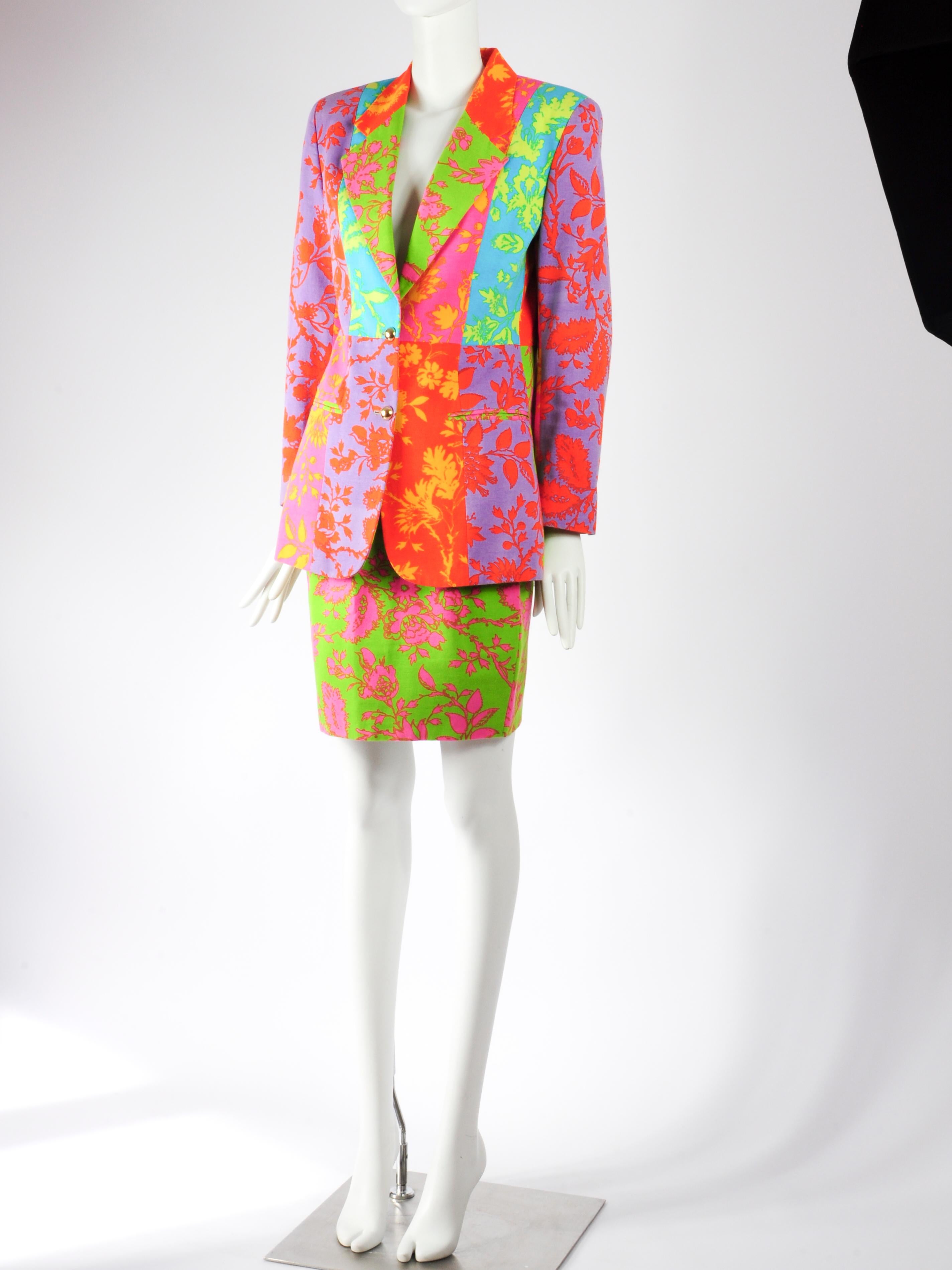 Brightly coloured, patchwork like, floral print Oliver by Valentino skirt suit is unlike anything I’ve ever seen from Valentino before. The skirt suit features the floral print in 5 different colour schemes and a matching skirt in lime green. There