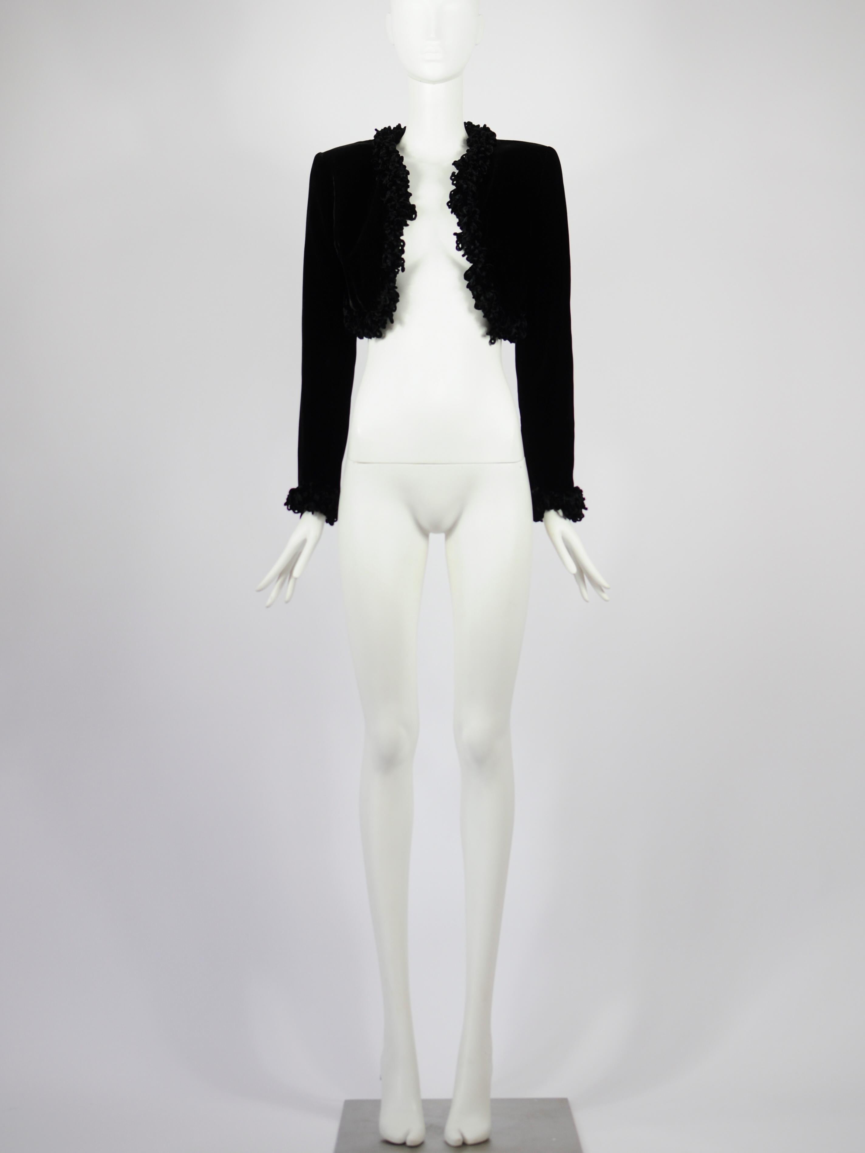 Oliver by Valentino vintage cropped bolero jacket in soft black velvet with chenille fringes on the bottom and sleeves. Truly a high end vintage piece, in perfect condition. It would make a great item for a fancy dinner party and could work over a