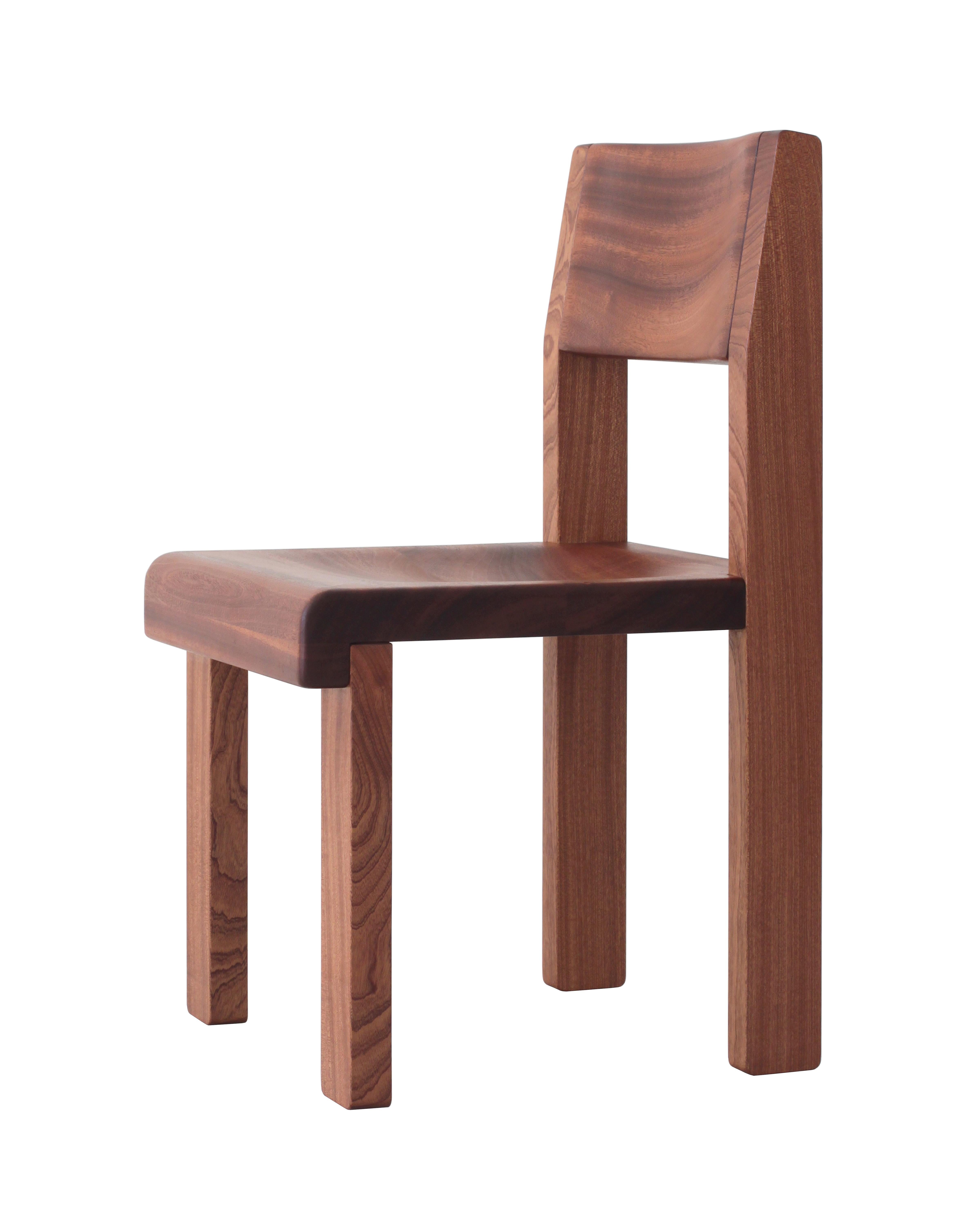 Oliver chair is made of solid sapele wood with a hand-rubbed oil finish. The design is robust yet simple, with clean lines and soft edges. Thick legs enable sturdy connections, limiting the number of parts needed, and the front and back legs are at