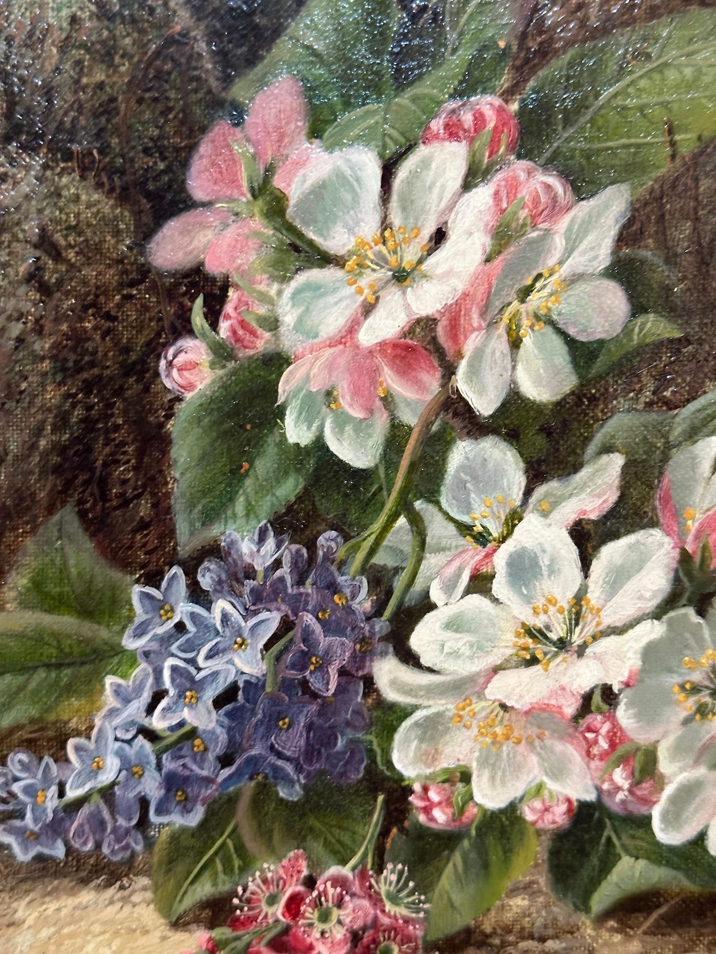 Pareja de bodegones victorianos de frutas y flores en un paisaje de ribera musgosa 2