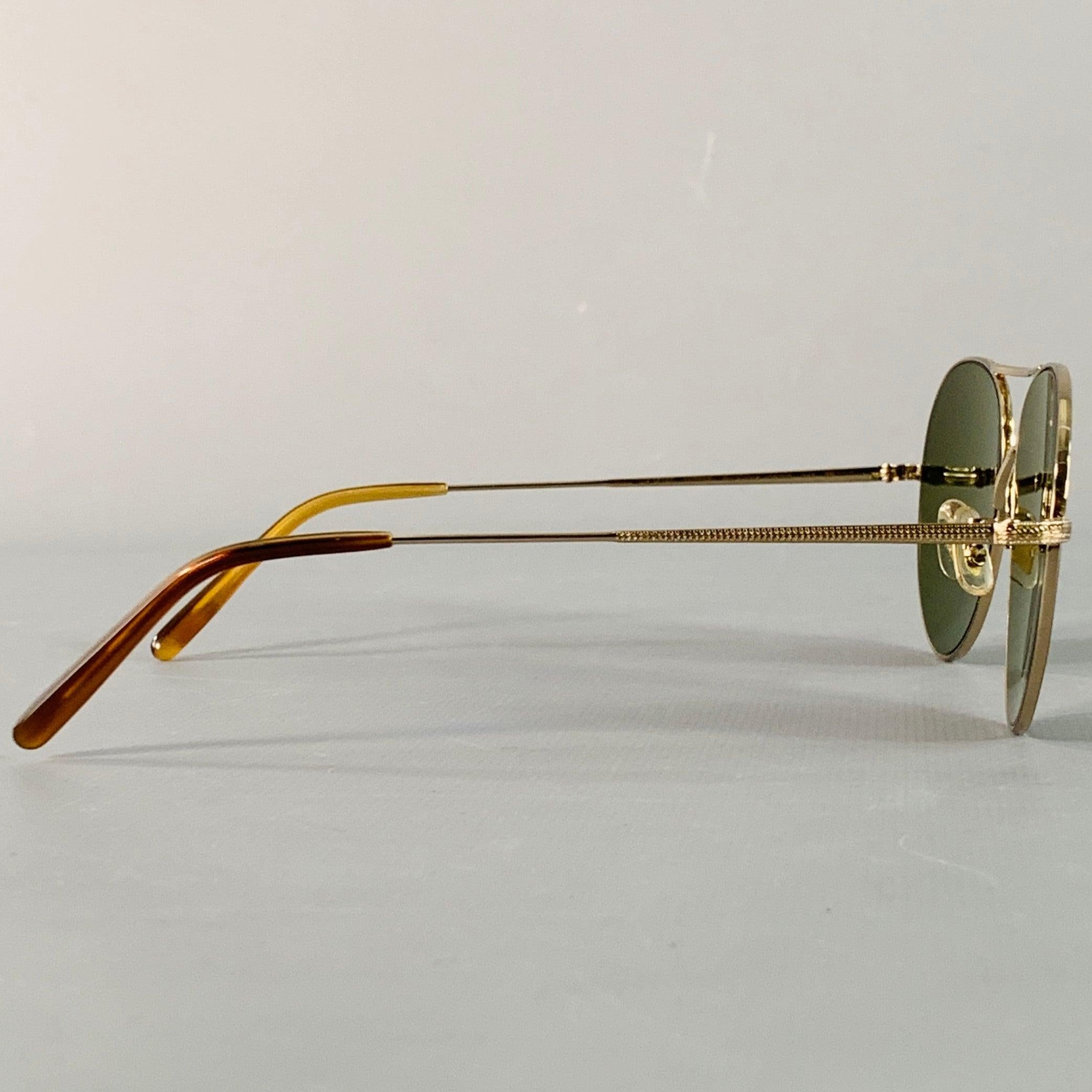 Nero Oliver Peoples Rockmore - Occhiali da sole Aviator in metallo con incisione in oro in vendita