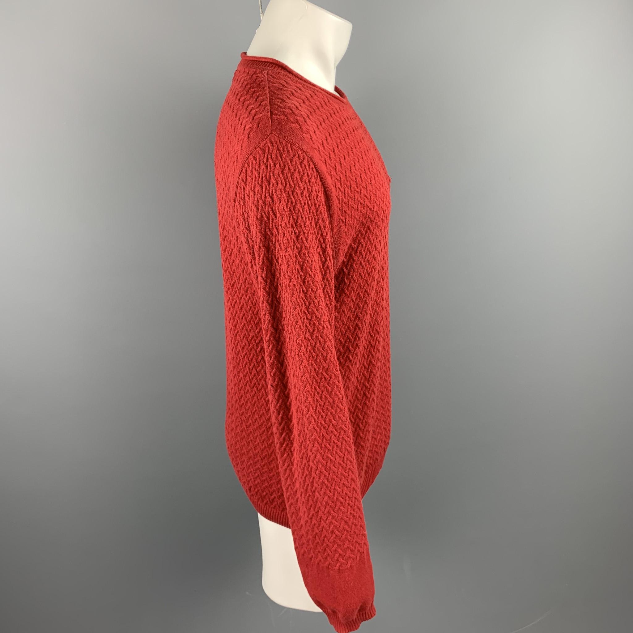 OLIVER SPENCER pullover comes red knitted cotton featuring a crew-neck and a front pocket. Made in Portugal.

Very Good Pre-Owned Condition.
Marked: M

Measurements:

Shoulder: 20 in. 
Chest: 40 in. 
Sleeve: 28 in. 
Length: 27.5 in. 