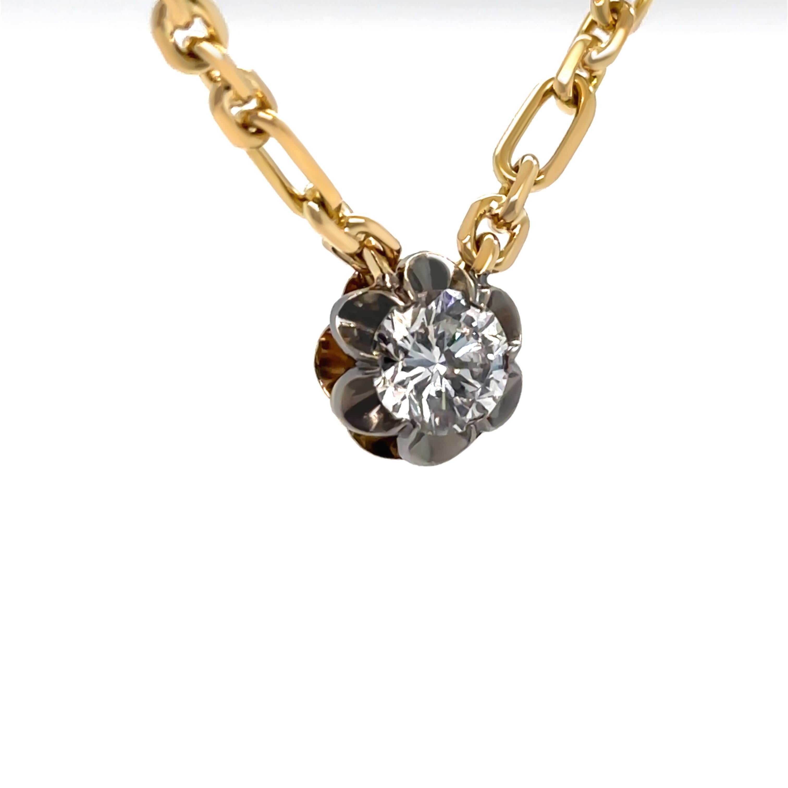 This stunning Olivia Bond Signature Scallop Necklace is crafted in 18ct yellow and white gold with black rhodium detailing, offering a striking two-tone design. The centrepiece features a 1.01ct round brilliant-cut diamond, graded E colour and SI1