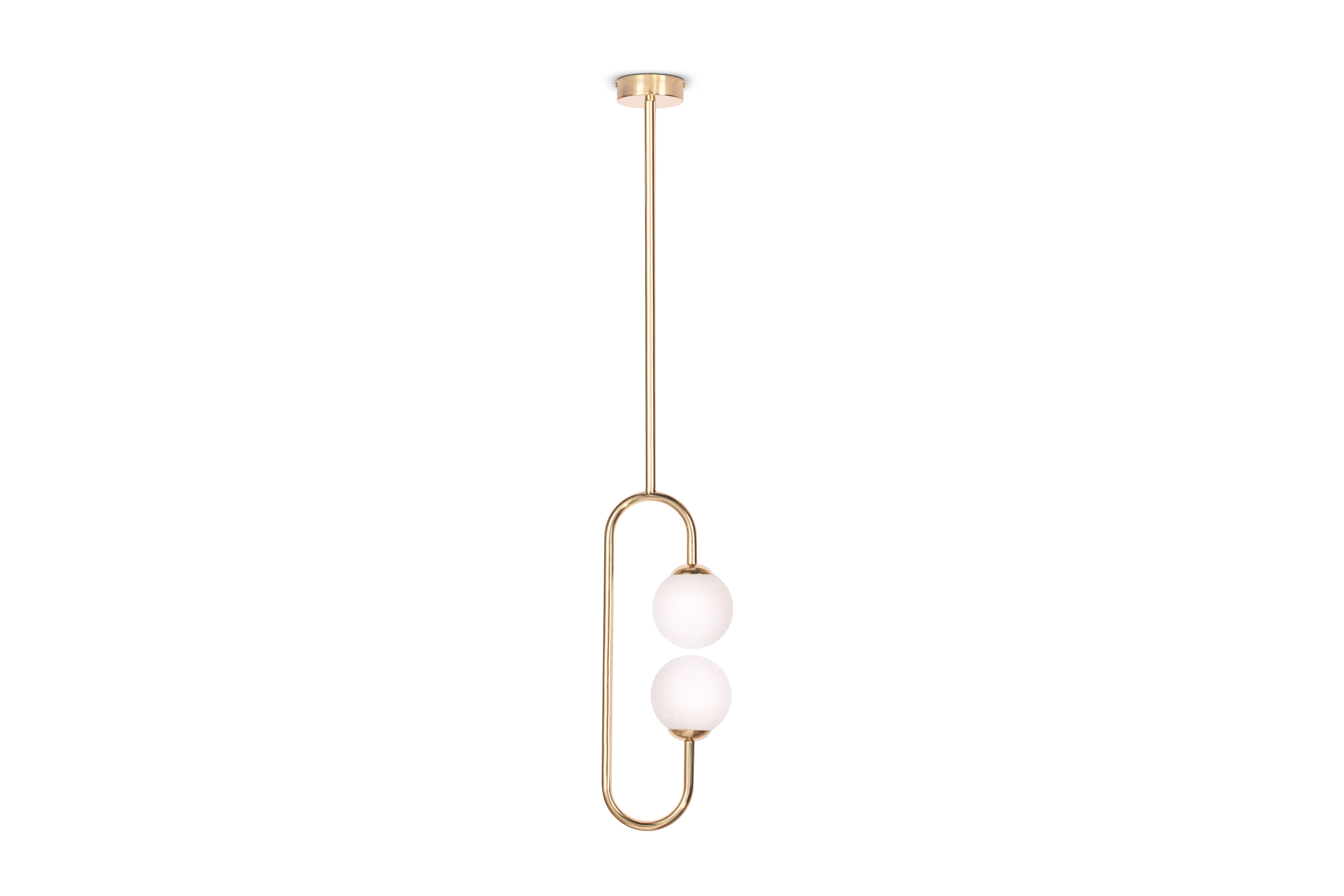 Olivia brass ceiling lamp, Royal Stranger
Dimensions: W 20 x D 14 x H 114 cm
Materials: Body polished brass. Glass balls Blown glass opal diffuser.


Inspired by the femininity and using bold and vibrant color schemes, this collection is meant