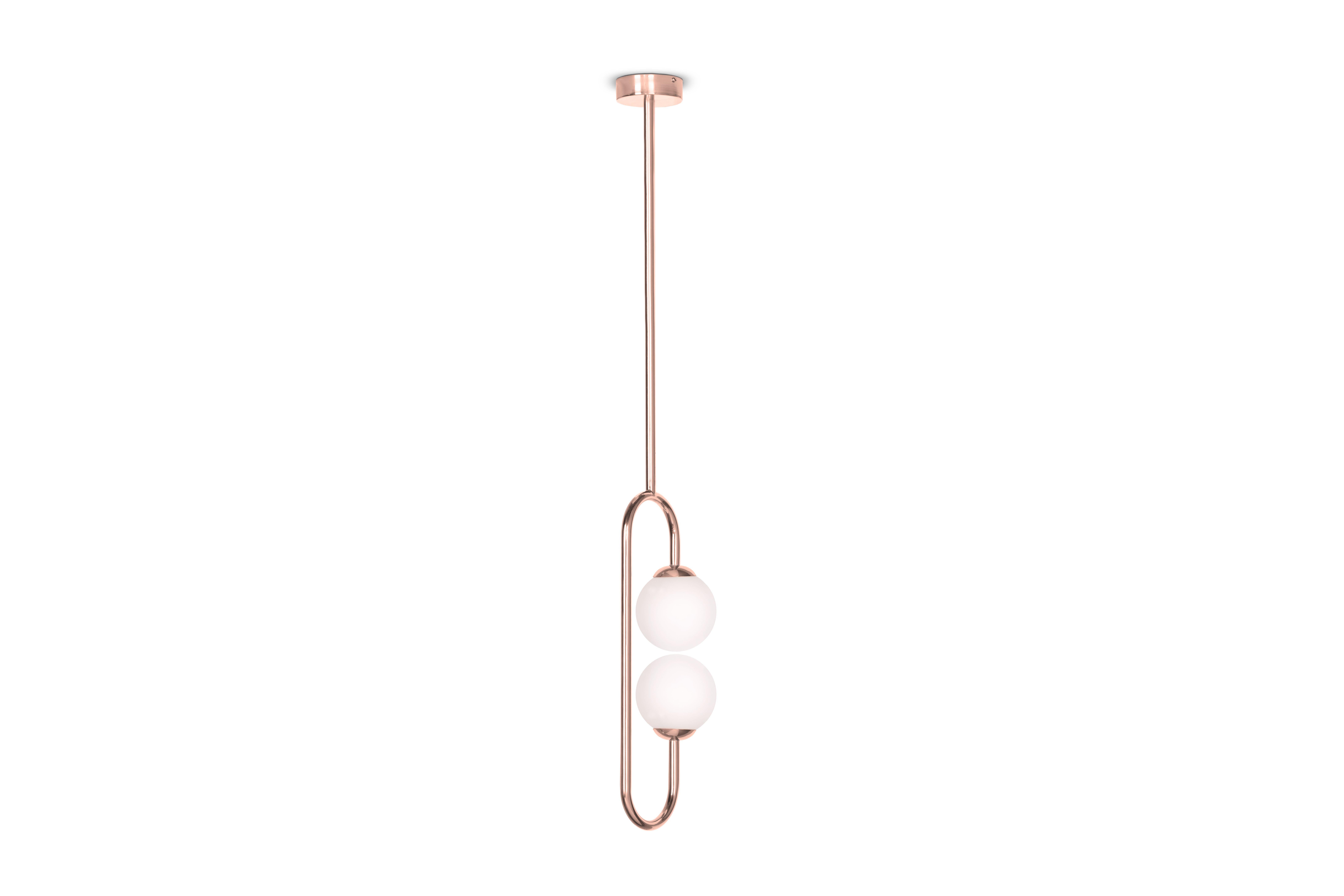 Olivia copper ceiling lamp, Royal Stranger
Dimensions: W 20 x D 14 x H 114 cm
Materials: Body polished brass. Glass balls Blown glass opal diffuser.


Inspired by the femininity and using bold and vibrant color schemes, this collection is meant