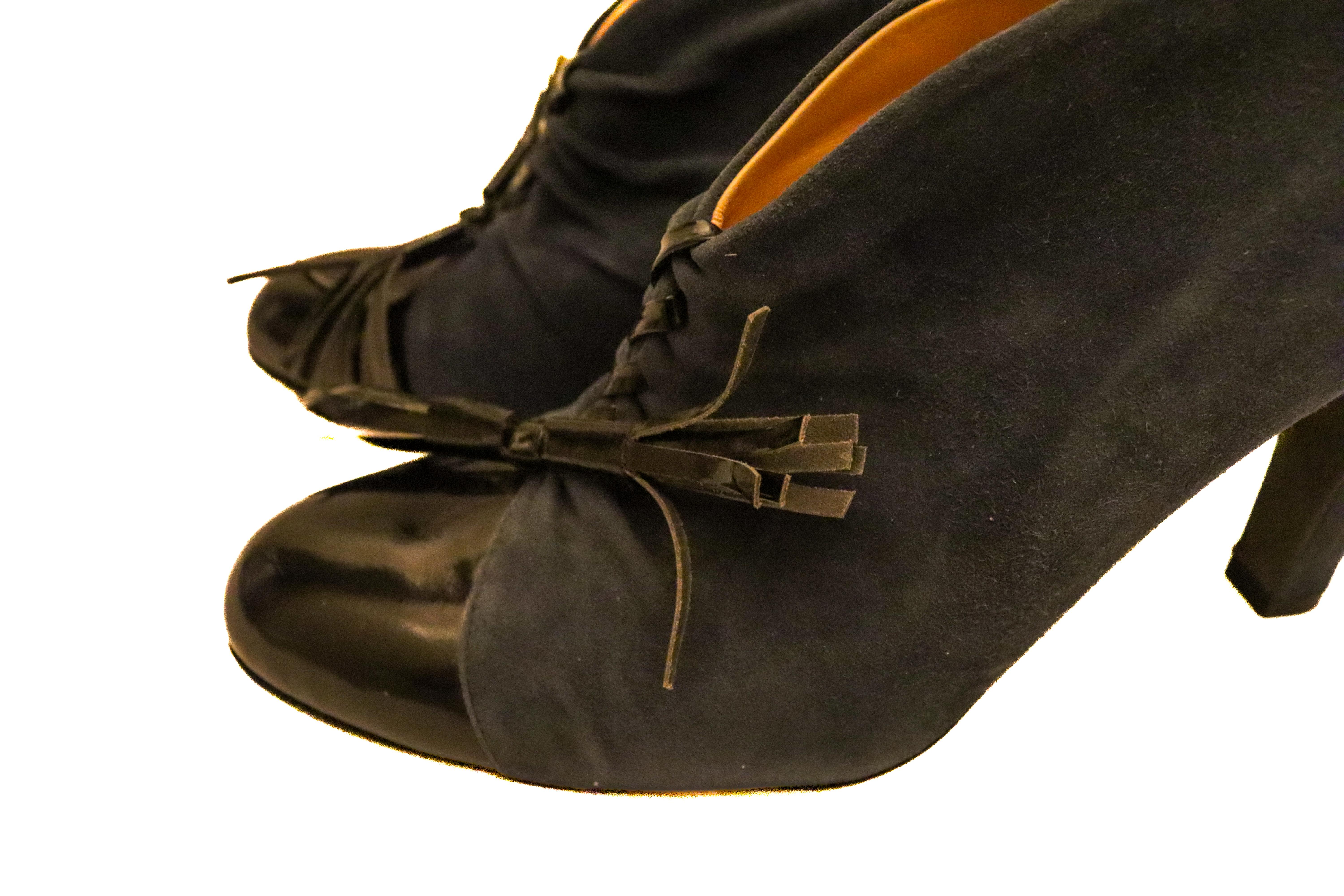 A great shoe boot by Olivia Morris. In a lovely sea green suede with black patent toe and lace. 
Leather lined. Size 39. Heel height 3 1/2 ''