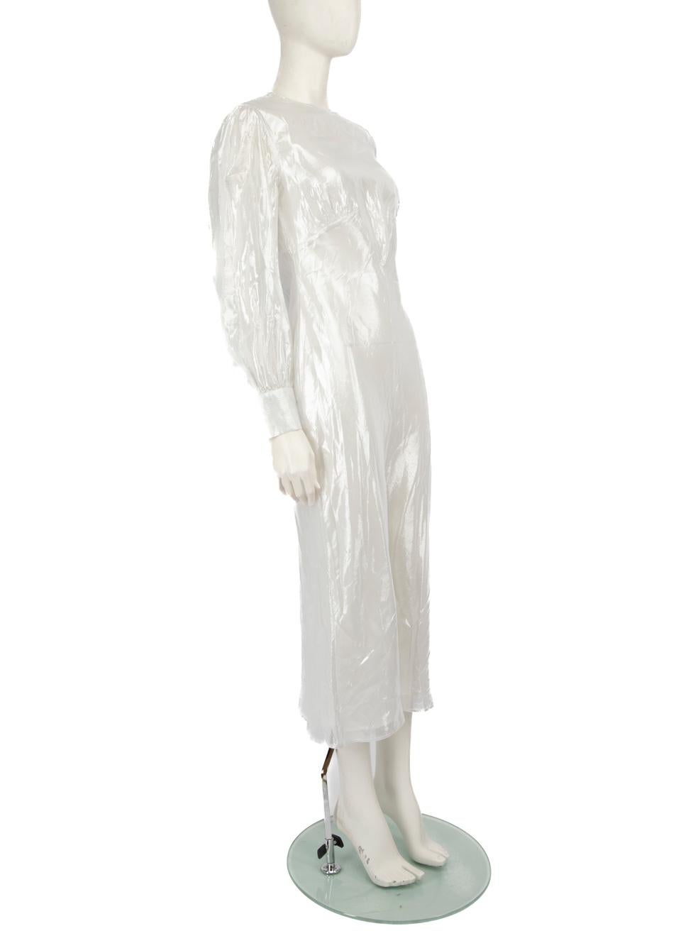 CONDITION is Very good. Minimal wear to the dress is evident. One mark on the lower front. Pluck to the weave on the hem at the front of this used Olivia Von Halle designer resale item.

Details


Silver

Silk

Dress

Midi

Long sleeves

See through
