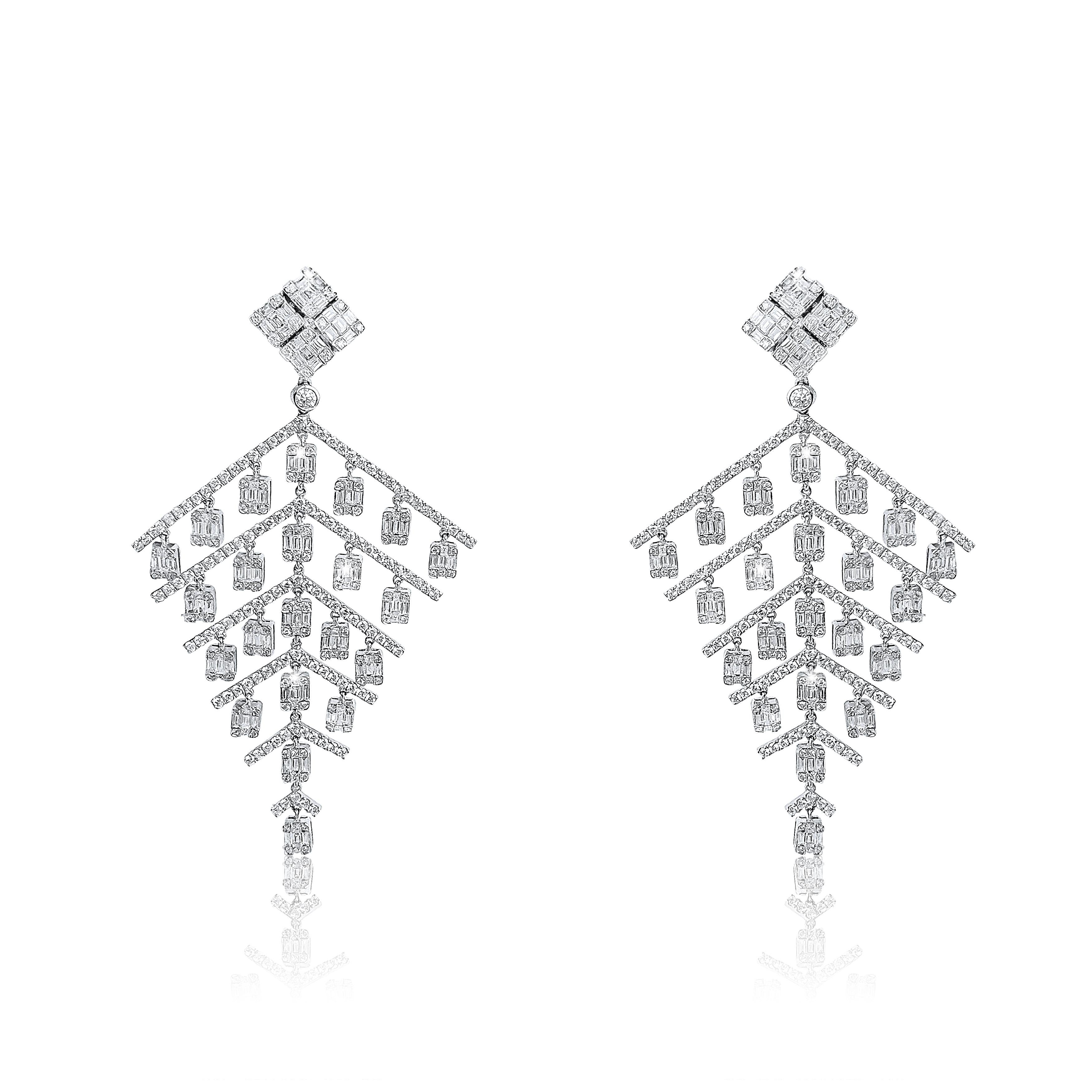 Earring Information
Metal Purity : 18K
Color : White Gold
Gold Weight : 19.58g
Length : 3.25''
Diamond Count : 454 Round Diamonds
Round Diamond Carat Weight : 3.94 ttcw
Baguette Diamonds Count : 172 
Baguette Diamonds Carat Weight : 3.67 ttcw
Serial