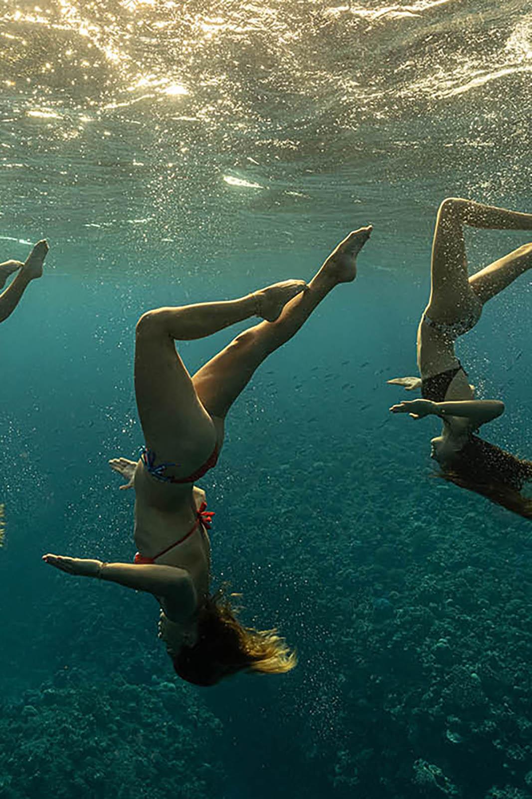 Synchronised swimming in the Blue - Fine art print, Color underwater photography - Photograph by Olivier Borde