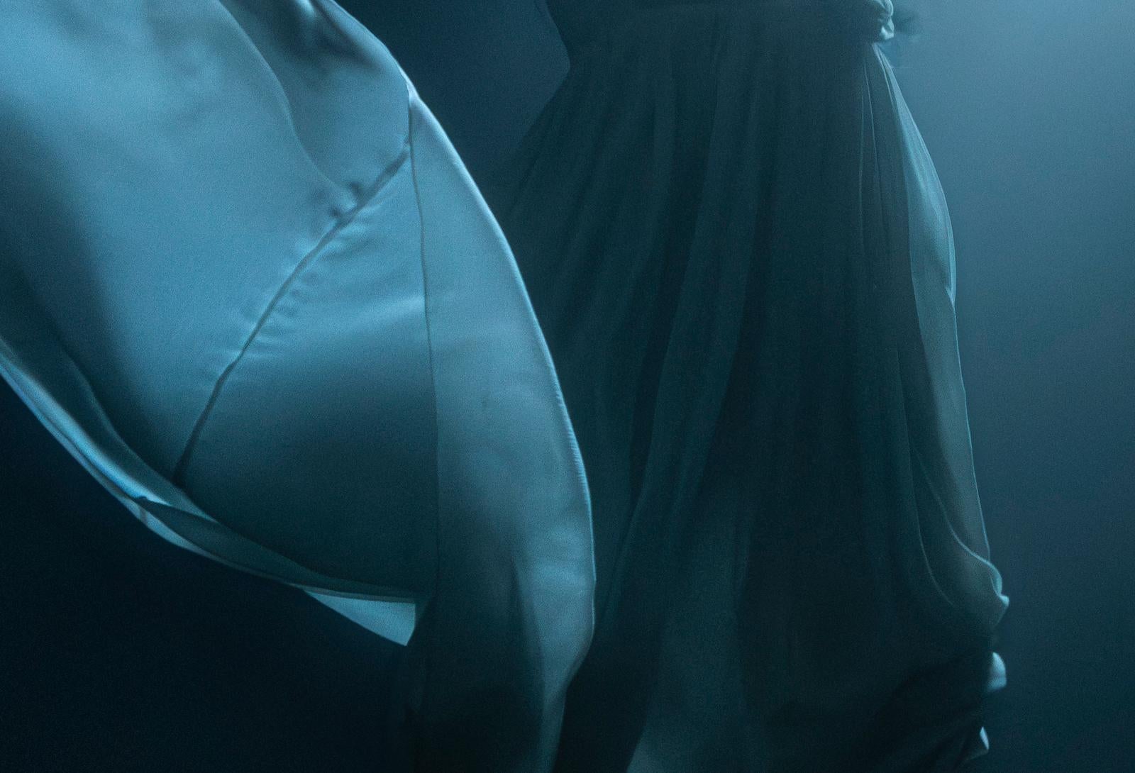 Vanessa into the Blue- Fine art print, Color underwater photography with a model - Contemporary Photograph by Olivier Borde