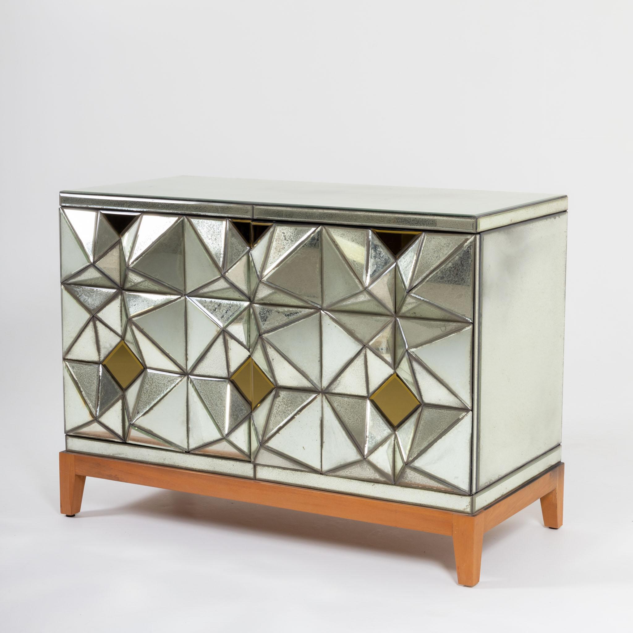 Two-door sideboard in the neo-vintage style by Olivier de Schrijver from the Ode's Design series with triangular or square discs, which are arranged in pyramids and thus create a concave-convex mirror surface. Inscribed, signed and numbered on the