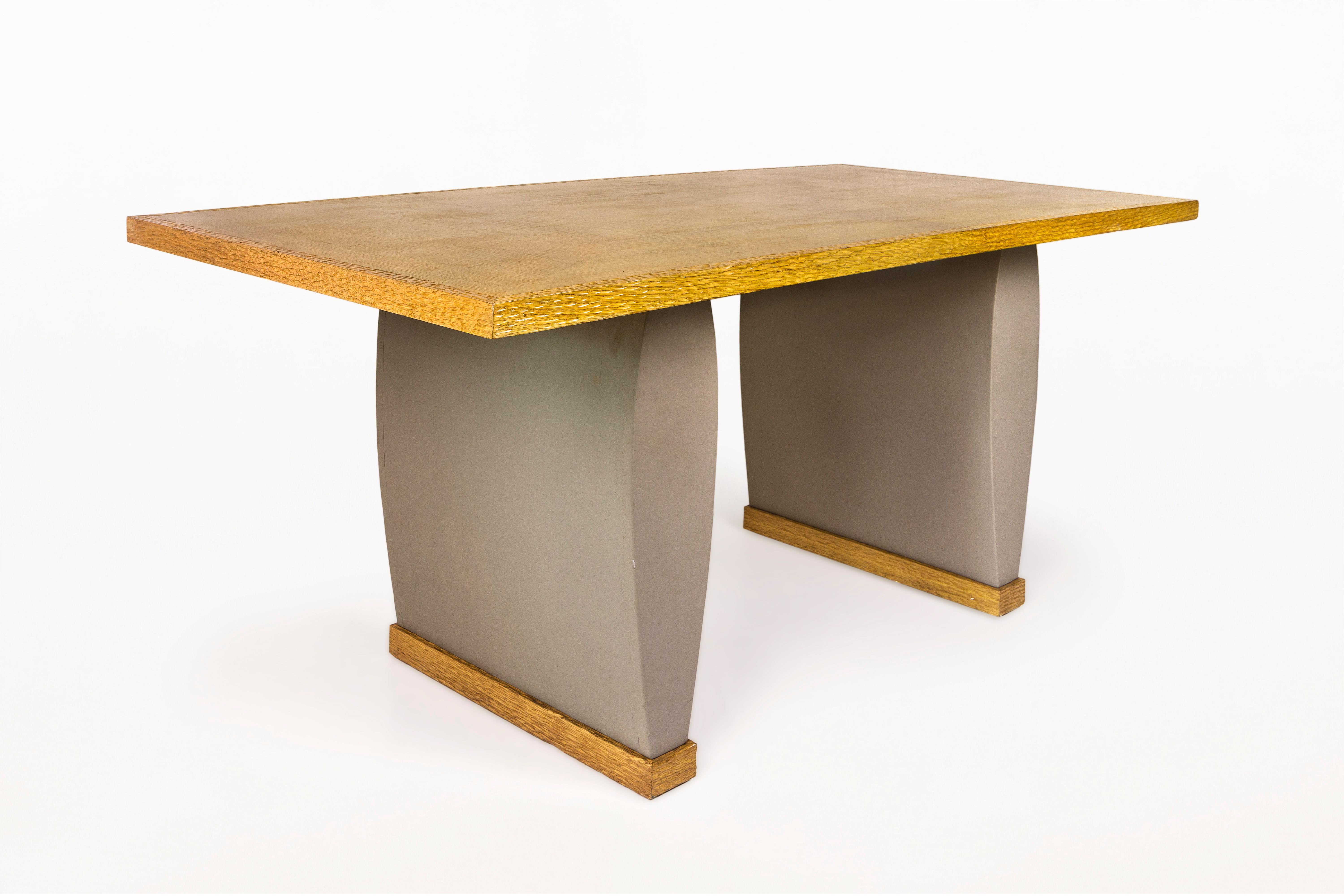 Olivier Gagnère, Neotù Table, 
oak and gray leather, 
circa 1995, France.

Measures: Height 77 cm, width 1m75, depth 90 cm.