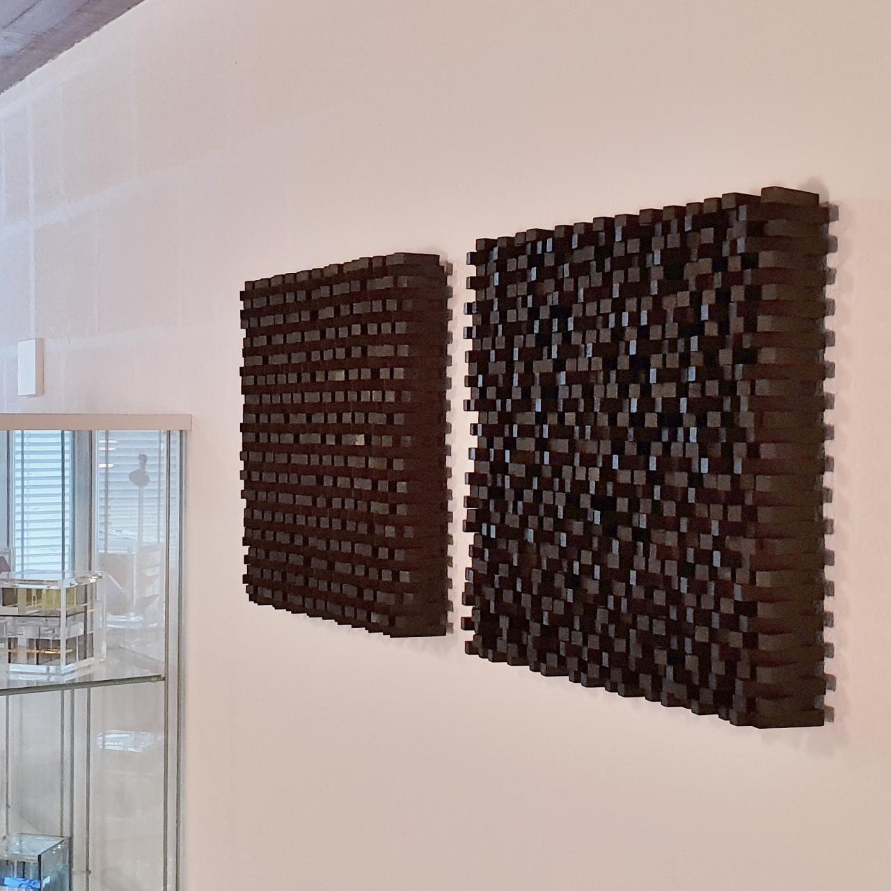 Confusion ritmique III no. 8/10 is one of a series of three different medium size contemporary modern sculpture painting relief by French-Dutch artist Olivier Julia. The relief is made from wood and finished with a mixture of anthracite grey and