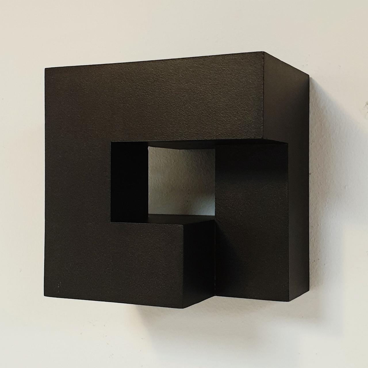 This Carré architectural triptych consists of three different small size contemporary modern abstract wall sculptures by French-Dutch artist Olivier Julia. These wall sculptures are made from carefully cut, glued and sanded wood fiberboard elements