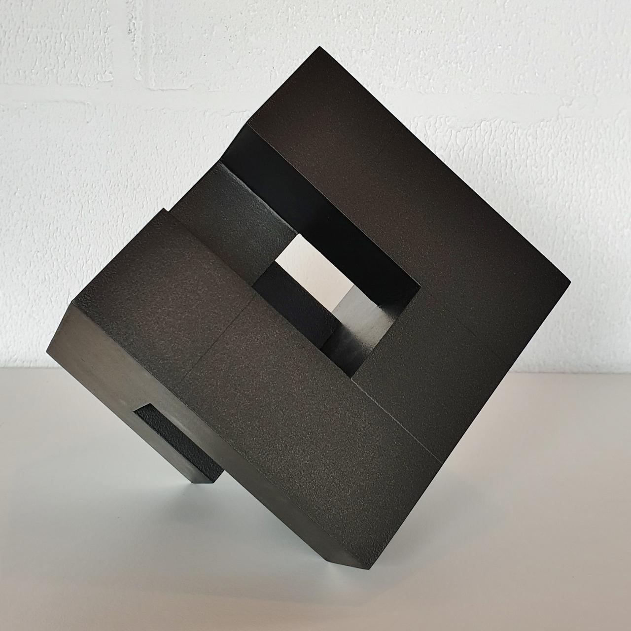 Cube architectural I is the first of two free standing contemporary modern abstract wall sculptures from the Architectural-series by French-Dutch artist Olivier Julia. This sculpture is made from carefully cut, glued and sanded wood fiberboard