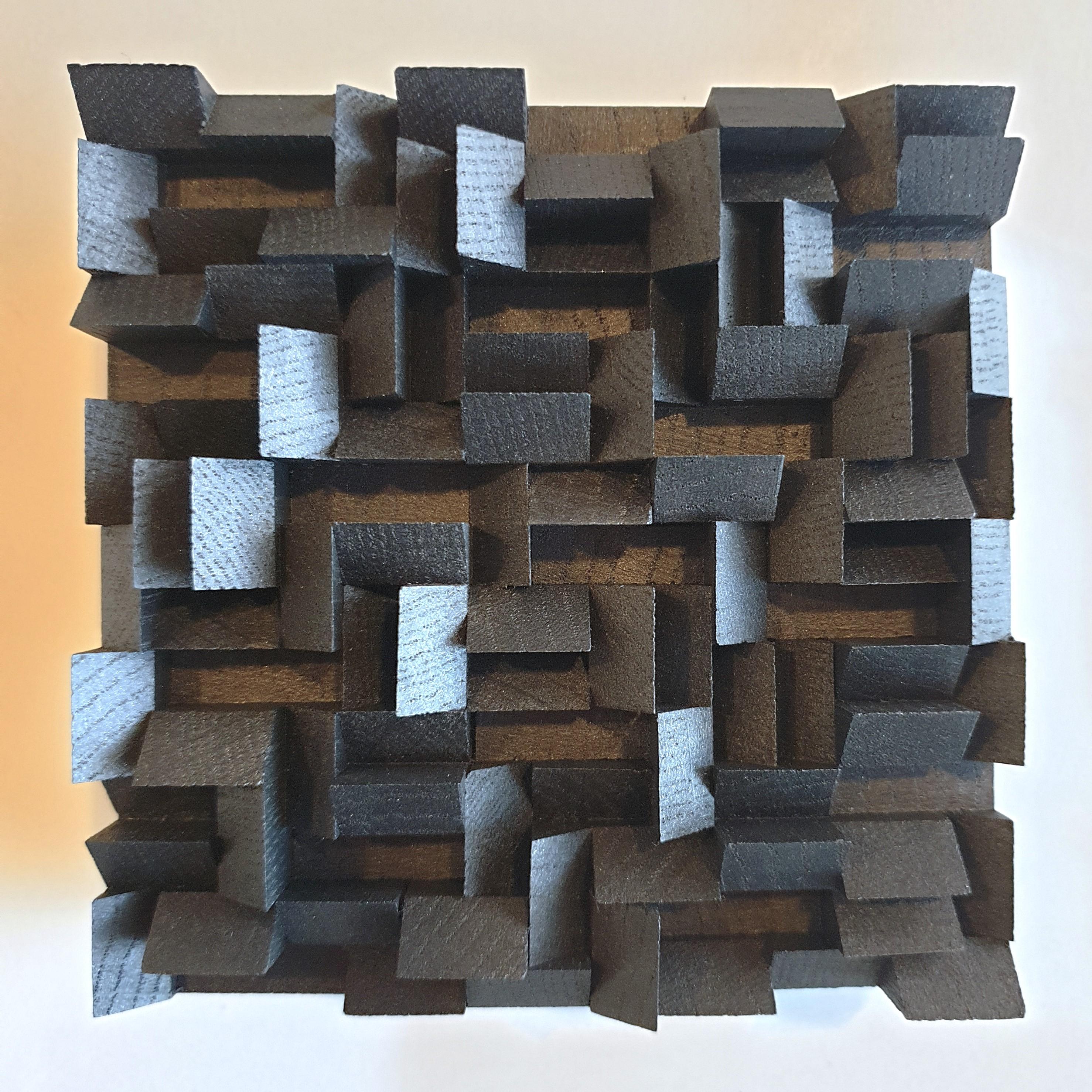 This Variation triptyque wall sculpture consists of three different small size contemporary modern abstract wall sculptures by French-Dutch artist Olivier Julia. These wall sculptures are each made individually from carefully cut, glued and sanded