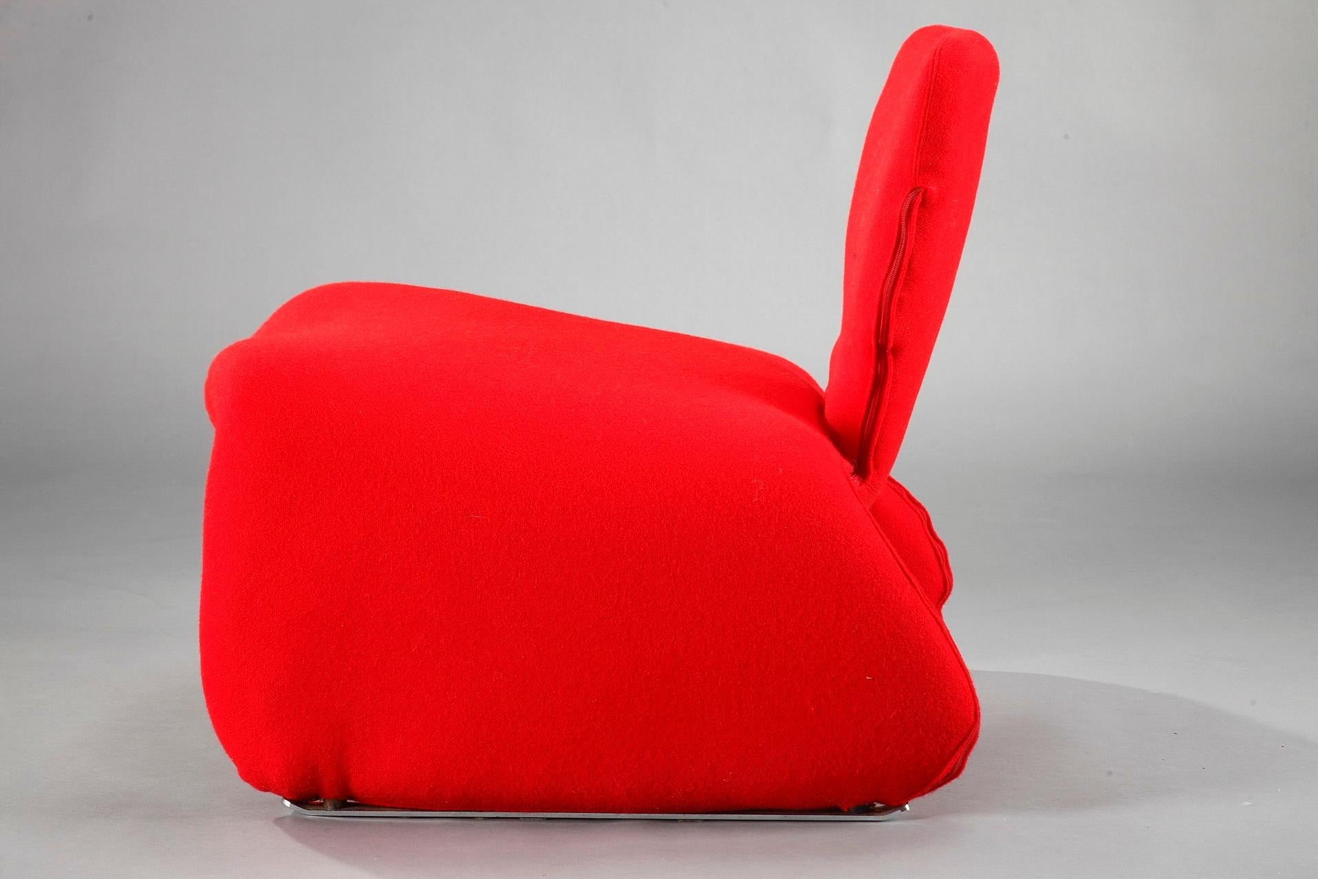 Djinn chair designed by Olivier Mourgue in the 1960s for Airborne. Metal structure lined with foam and covered with red fabric. Steel skates. This chair is an icon of 20th century design made famous by Stanley Kubrick in the movie 2001, the Space