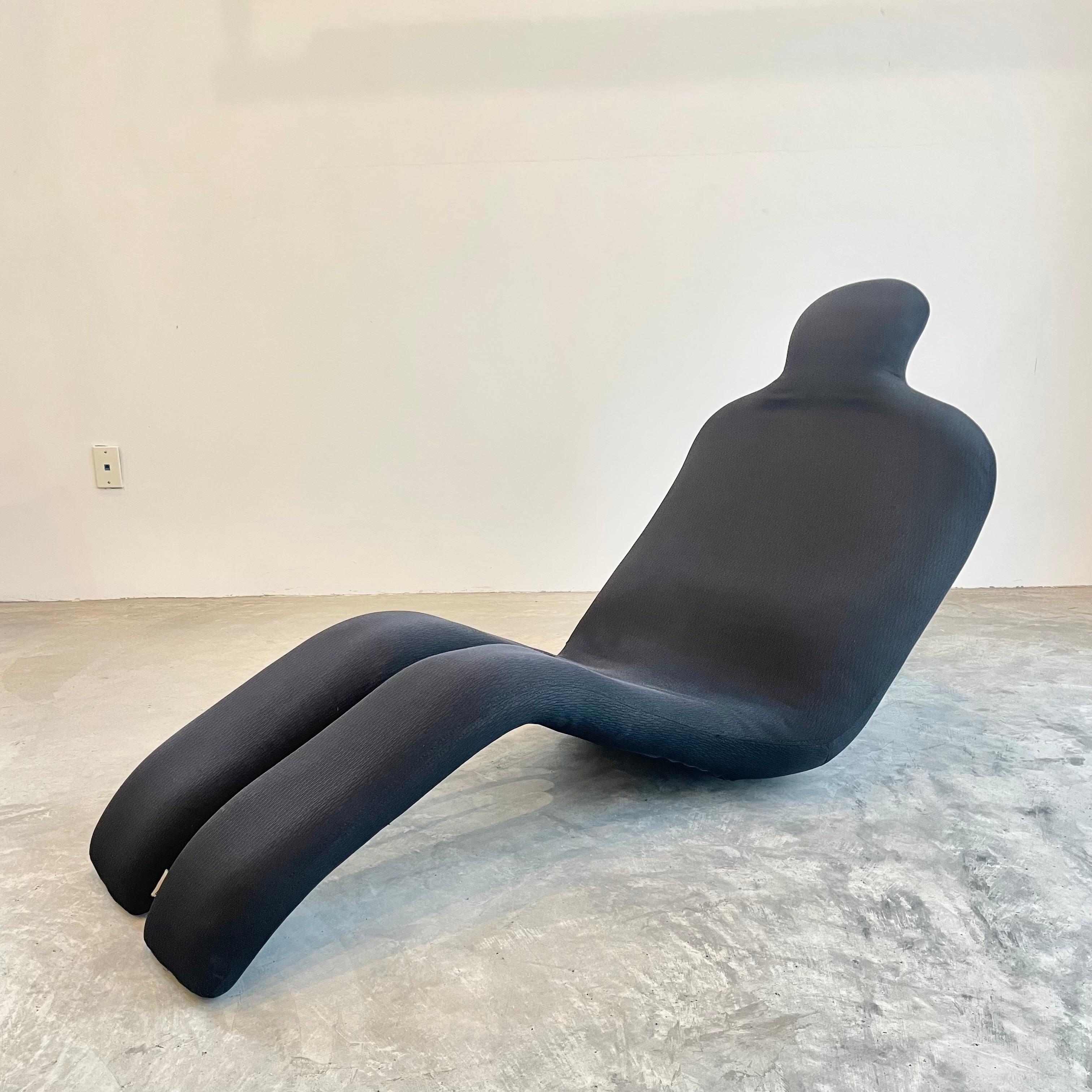 Sleek chaise lounge chair by Olivier Mourgue. Made in France, 1970s. Black fabric in good vintage condition with some light fading. Presents extremely well. Great piece of usable art. Original Arconas label at the foot. Extremely