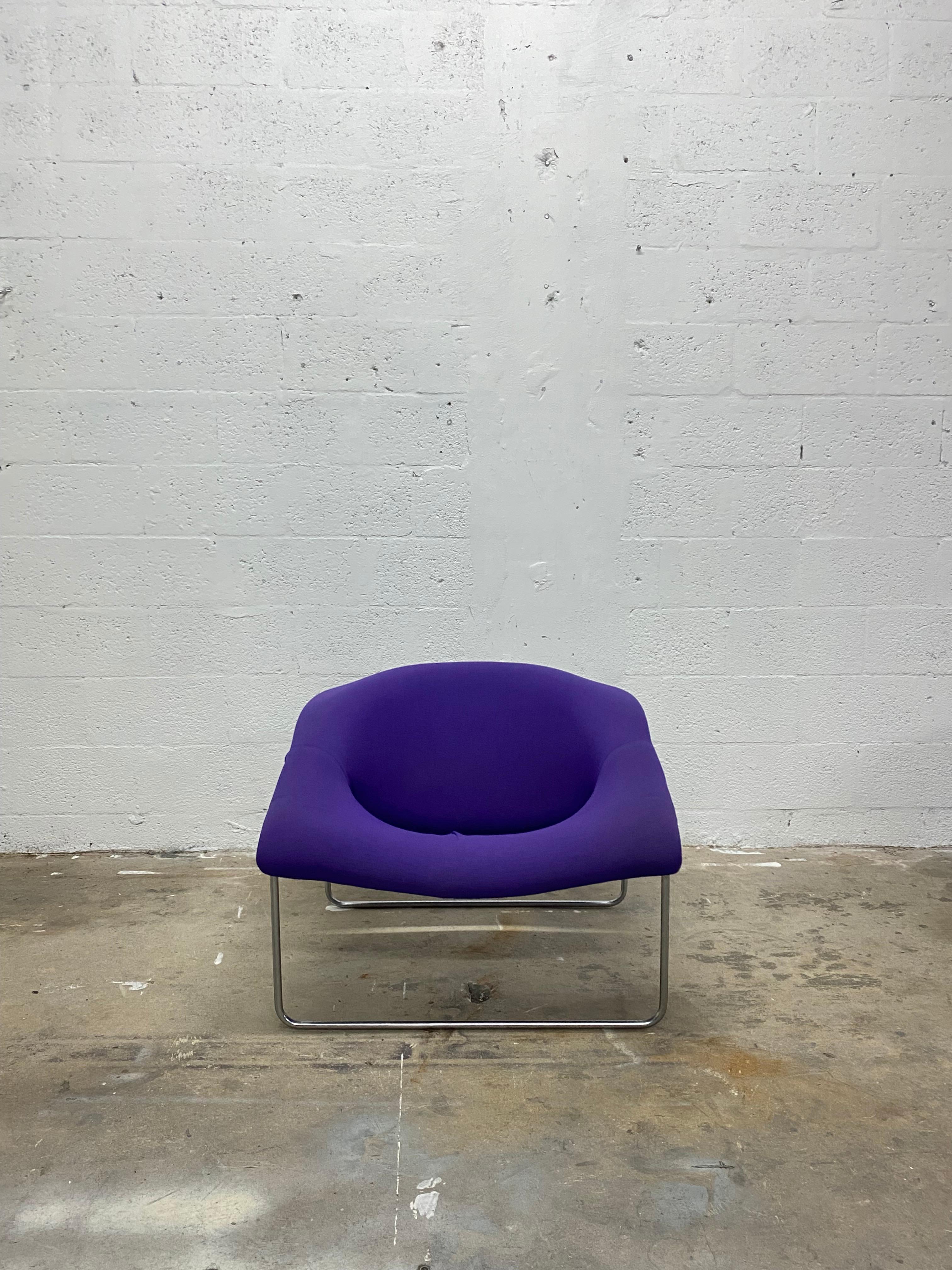 Rare and collectible Cubique lounge chairs with internal fiberglass shell wrapped in injected foam rubber, covered in original purple jersey like fabric with purple zipper and suspended from a metal wire frame. Original design by Olivier Mourgue and