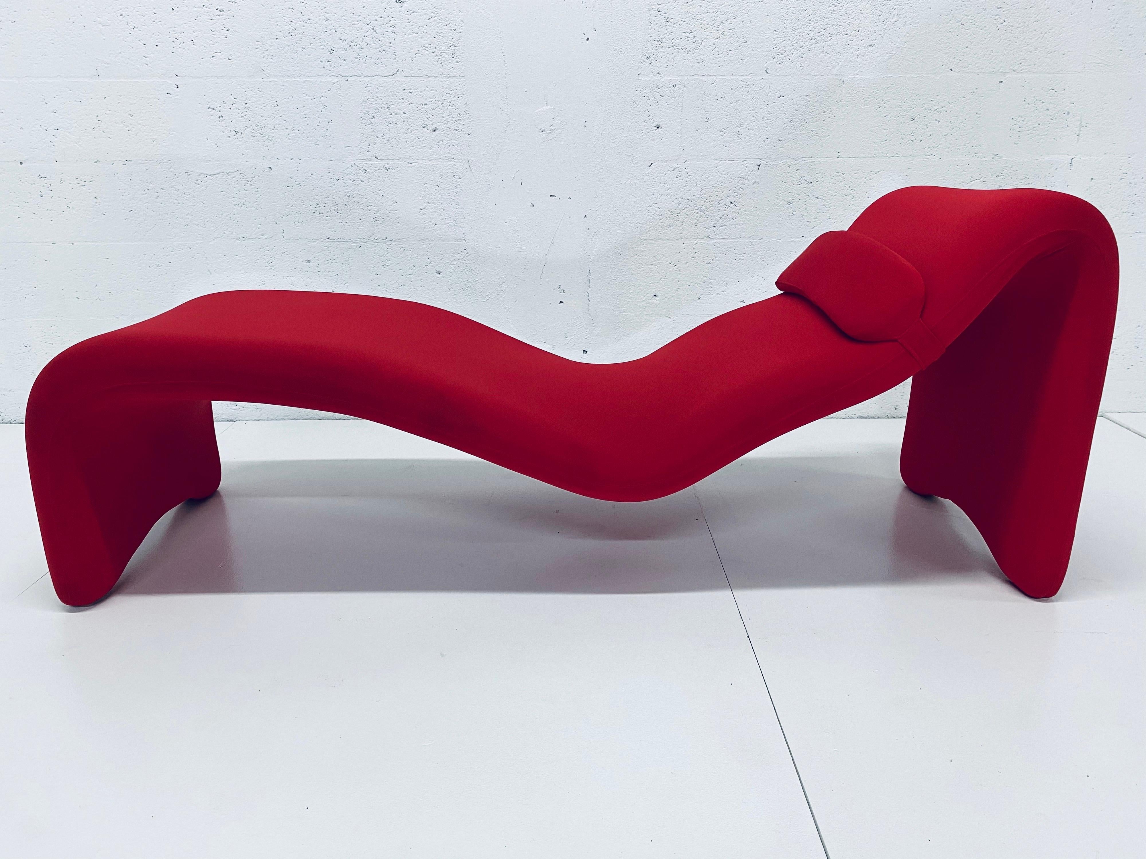 Originally designed by Olivier Mourgue for Airborne, this wave chaise lounge consists of a stretchy red jersey fabric over a foam and steel frame and was manufactured by Quebec 69, Canada. The fabric is original and shows wear, use as is or have