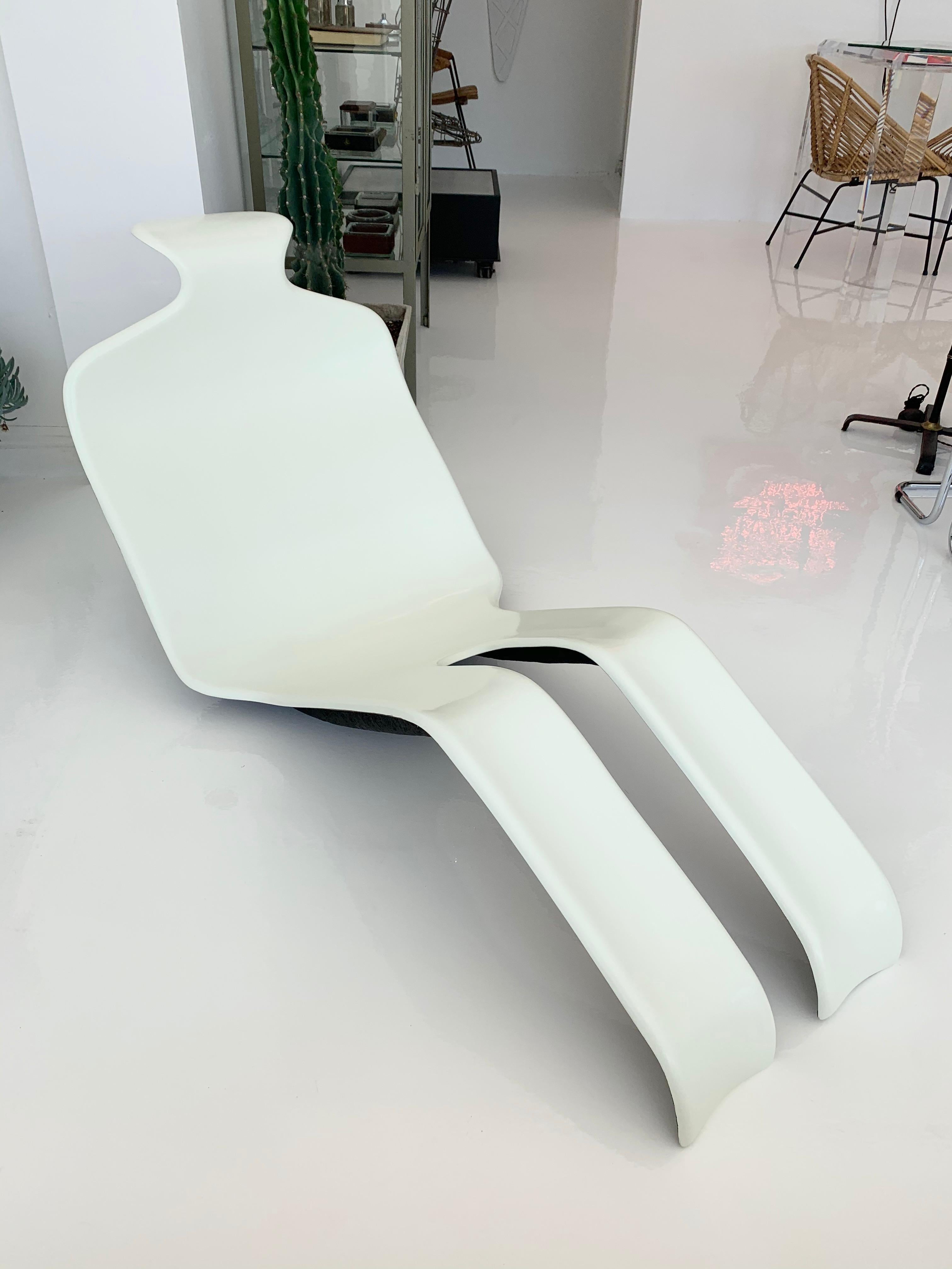 Great sculptural fiberglass lounge chairs by Olivier Mourgue for Airborne. Made in 1971. Excellent condition. Newly restored/painted in automotive paint which holds up really well outdoors.  Cool piece of art for indoors or outside by the pool. Very