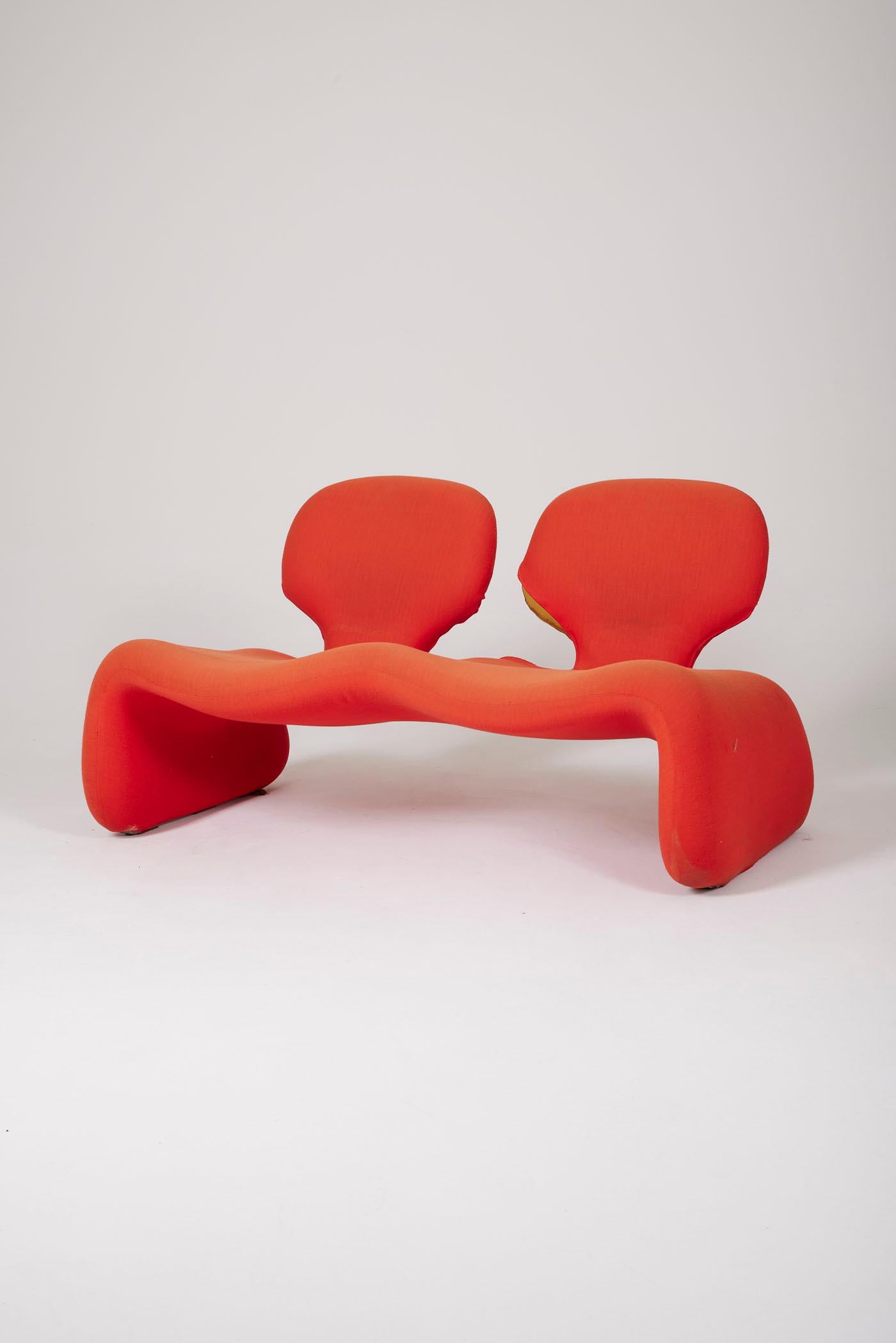 Two-seater sofa model Djinn by French designer Olivier Mourgue for Airborne, 1960s. Metal frame padded with foam and covered in its original red Kvadrat fabric. This sofa gained fame through Stanley Kubrick's 2001: A Space Odyssey. It is ready for
