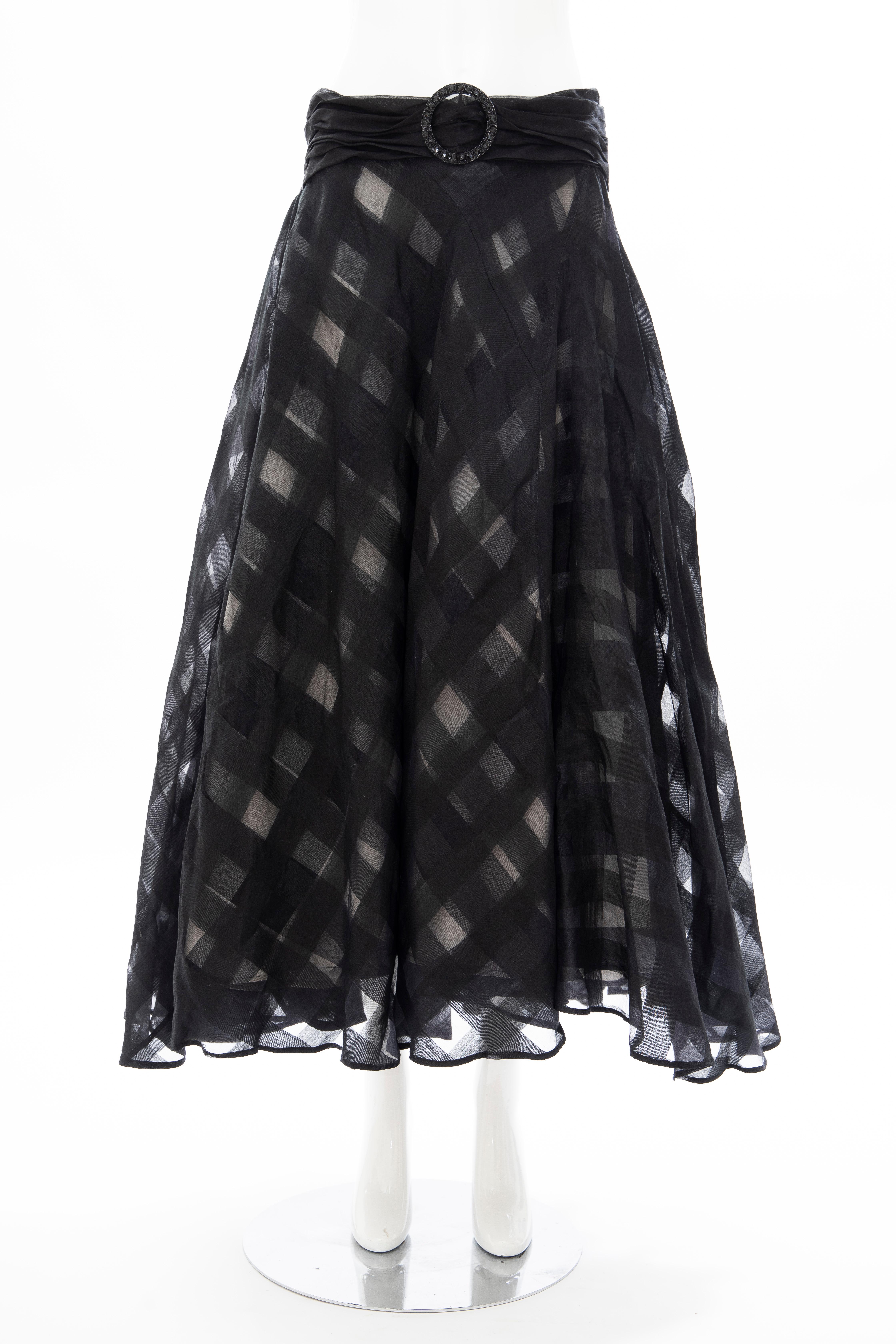 Olivier Theyskens, Runway Spring 2000, black silk checkerboard pattern circle skirt with attached black diamante buckle cummerbund, back concealed zip and hook-and-eye closure.

IT. 42, US. 6

Waist: 28